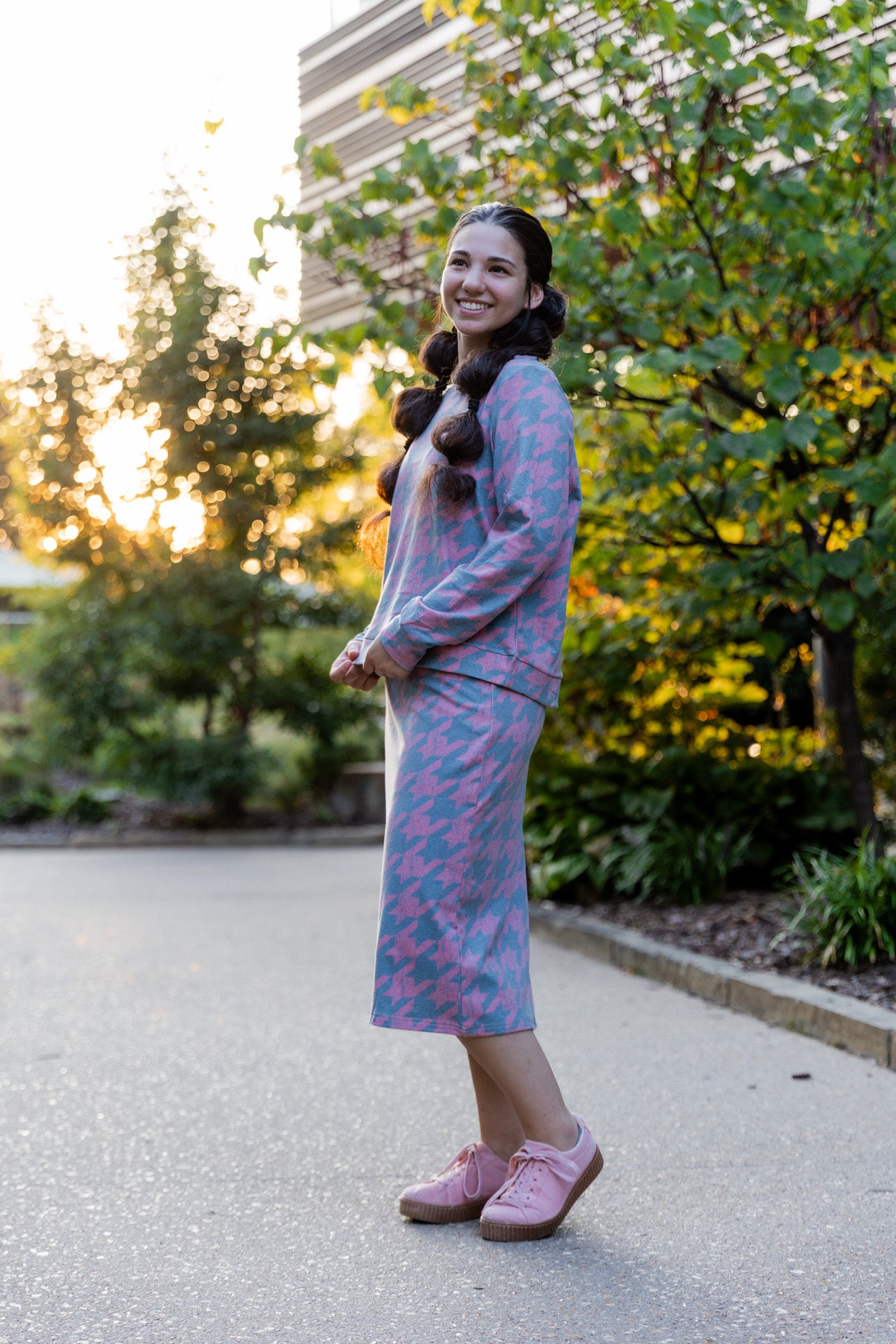 Nuggles® Iris two-piece set featuring soft knit midi skirt and crew-neck sweatshirt top