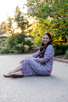 Nuggles® Iris two-piece set featuring soft knit midi skirt and crew-neck sweatshirt top