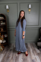Model showing the modest and stylish Nuggles® Maxi Bristol Dress in assorted prints.