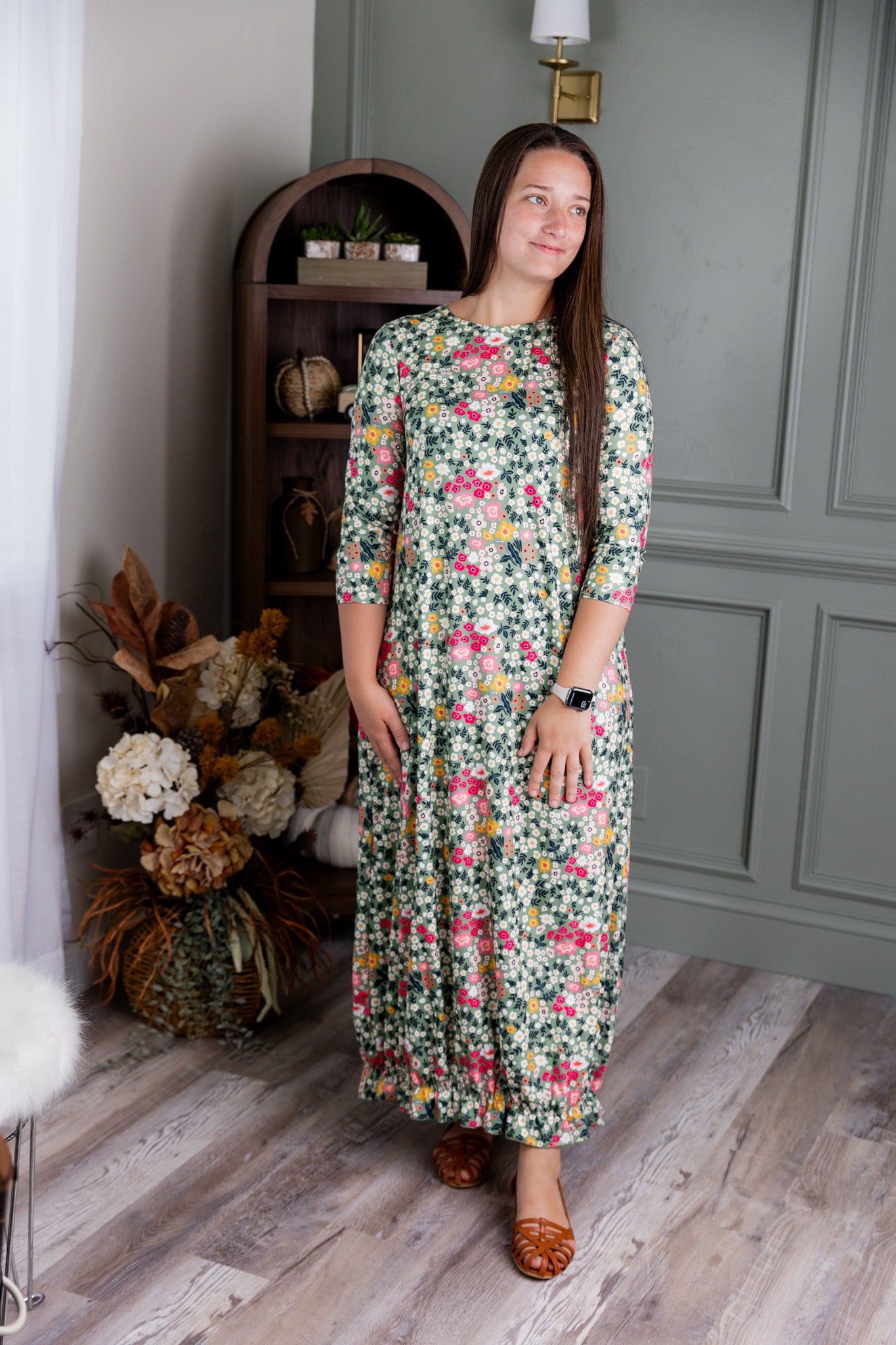 Model showing the modest and stylish Nuggles® Maxi Bristol Dress in assorted prints.