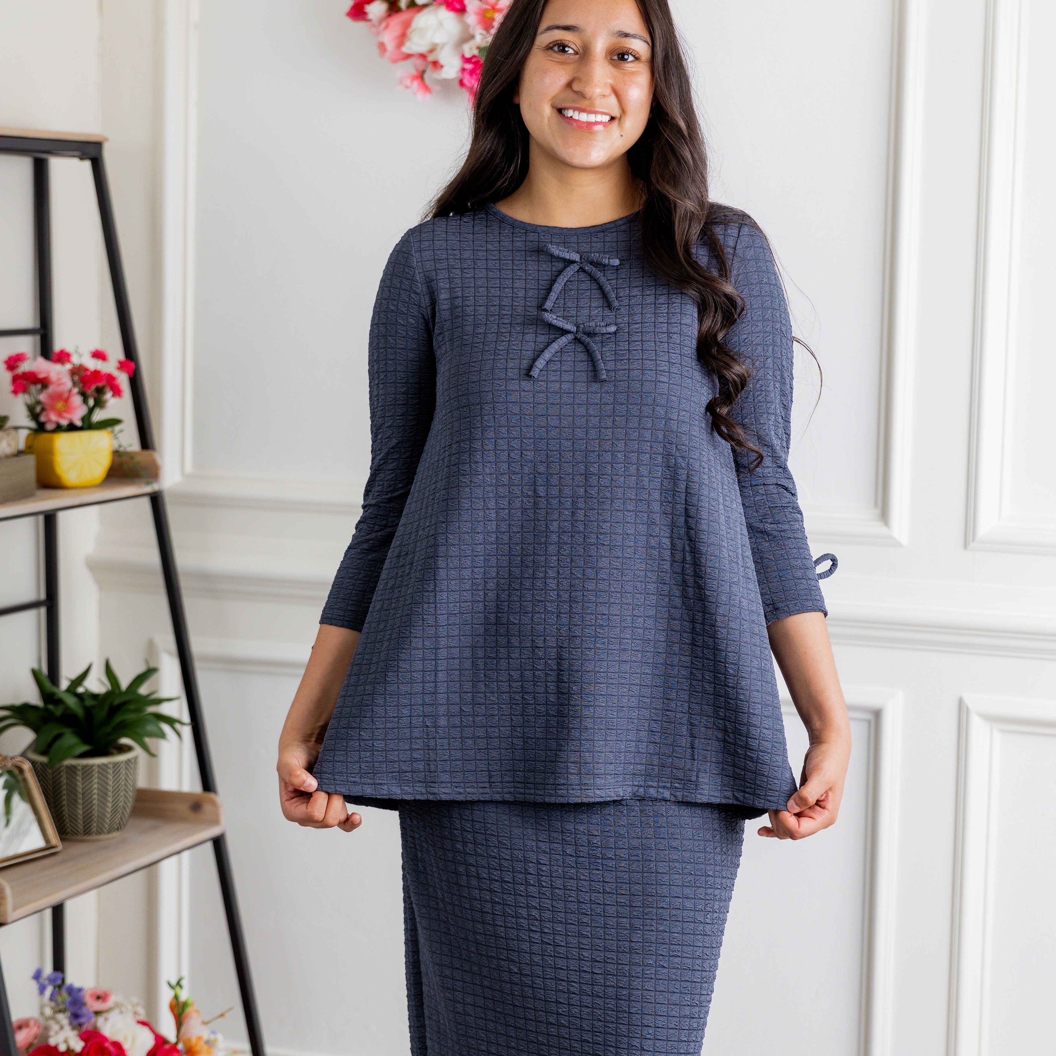 Nuggles® Lexi Top in waffle knit with 3/4 sleeves, bow detail, and modest A-line fit for women