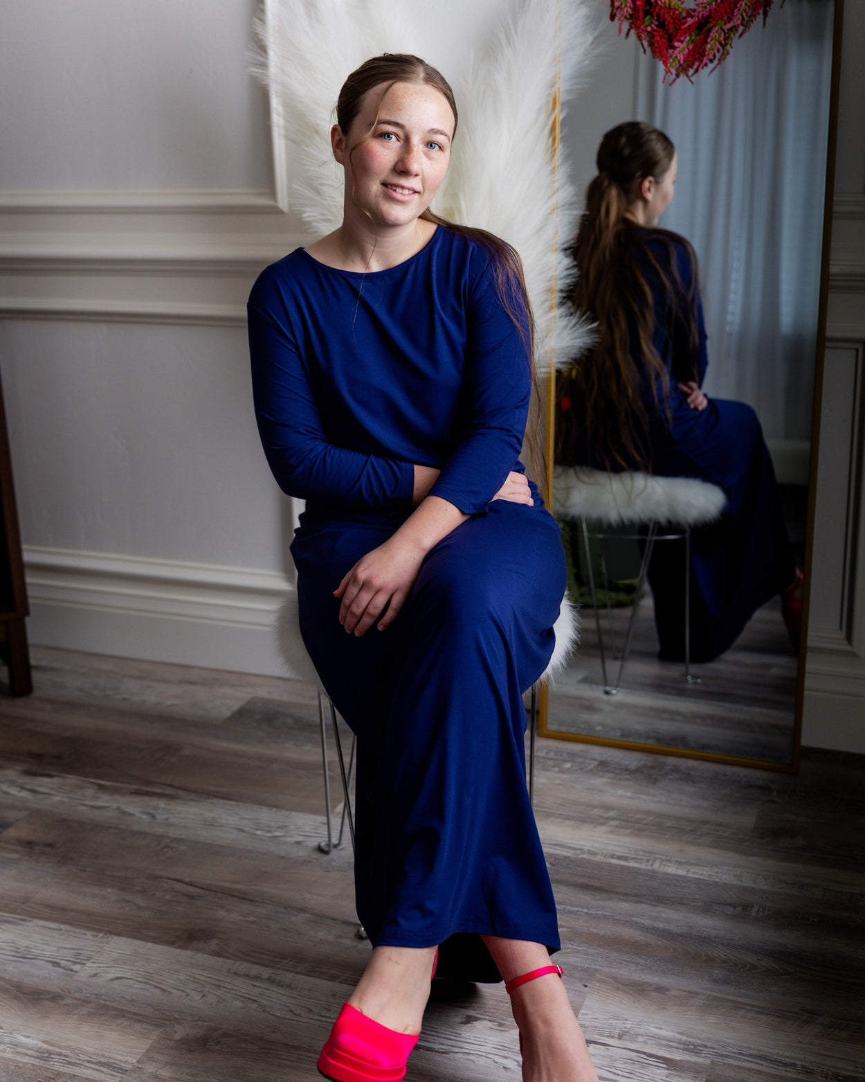 Model wearing Nuggles® Maxi Layering Dress in Dark Blue
