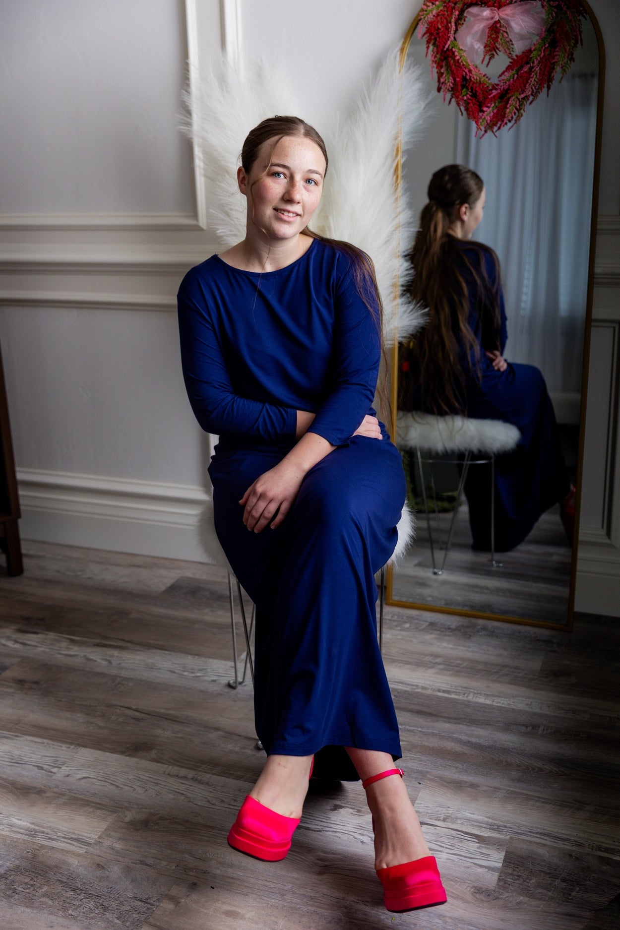 Model wearing Nuggles® Maxi Layering Dress in Dark Blue