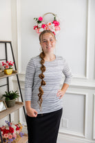 Relaxed Essential Tee styled with a modest skirt