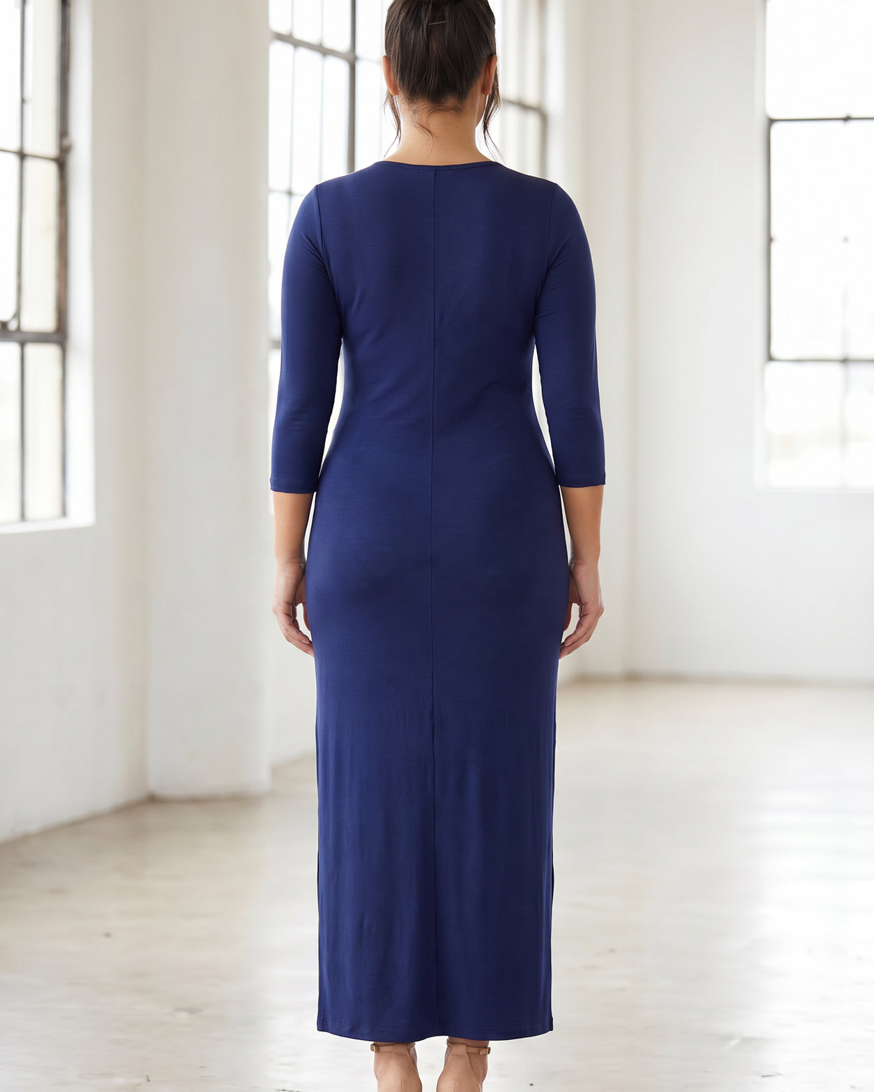 Model wearing Nuggles® Maxi Layering Dress in Dark Blue