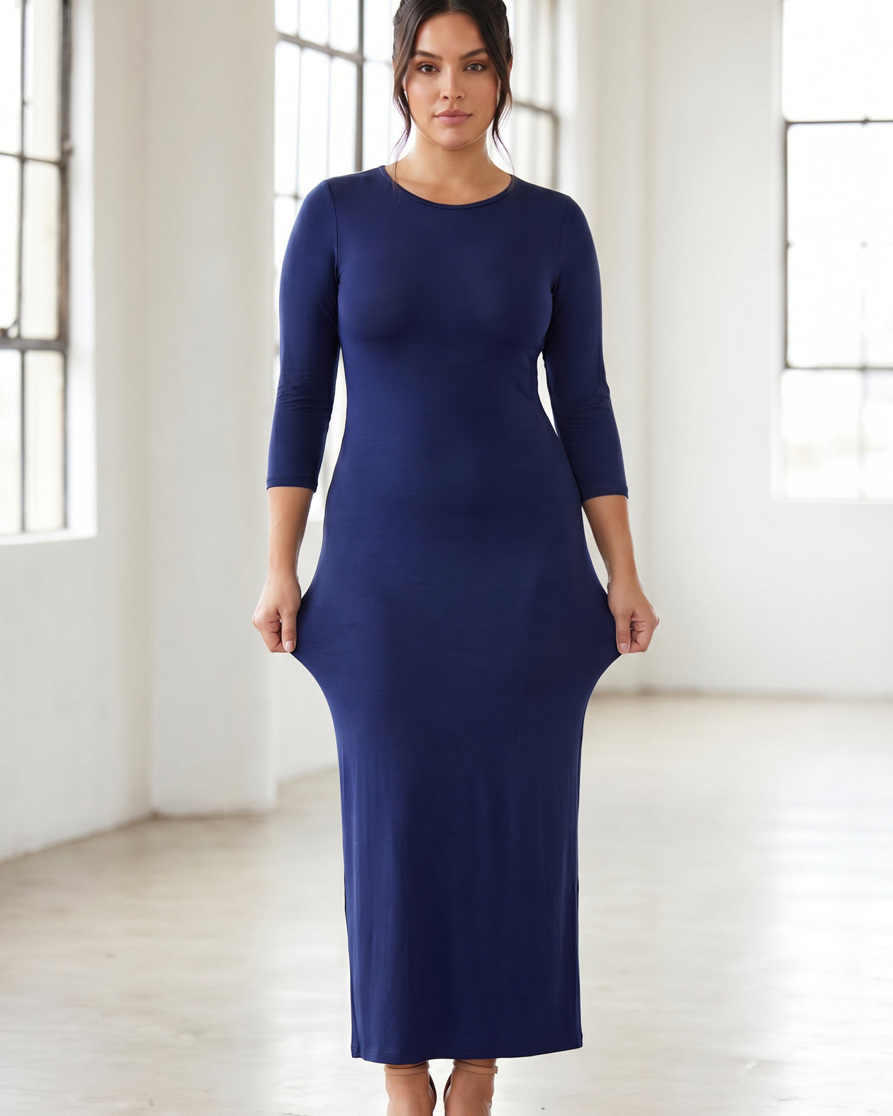 Model wearing Nuggles® Maxi Layering Dress in Dark Blue