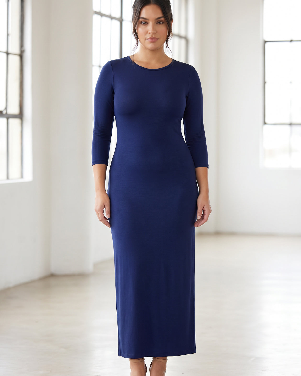 Model wearing Nuggles® Maxi Layering Dress in Dark Blue