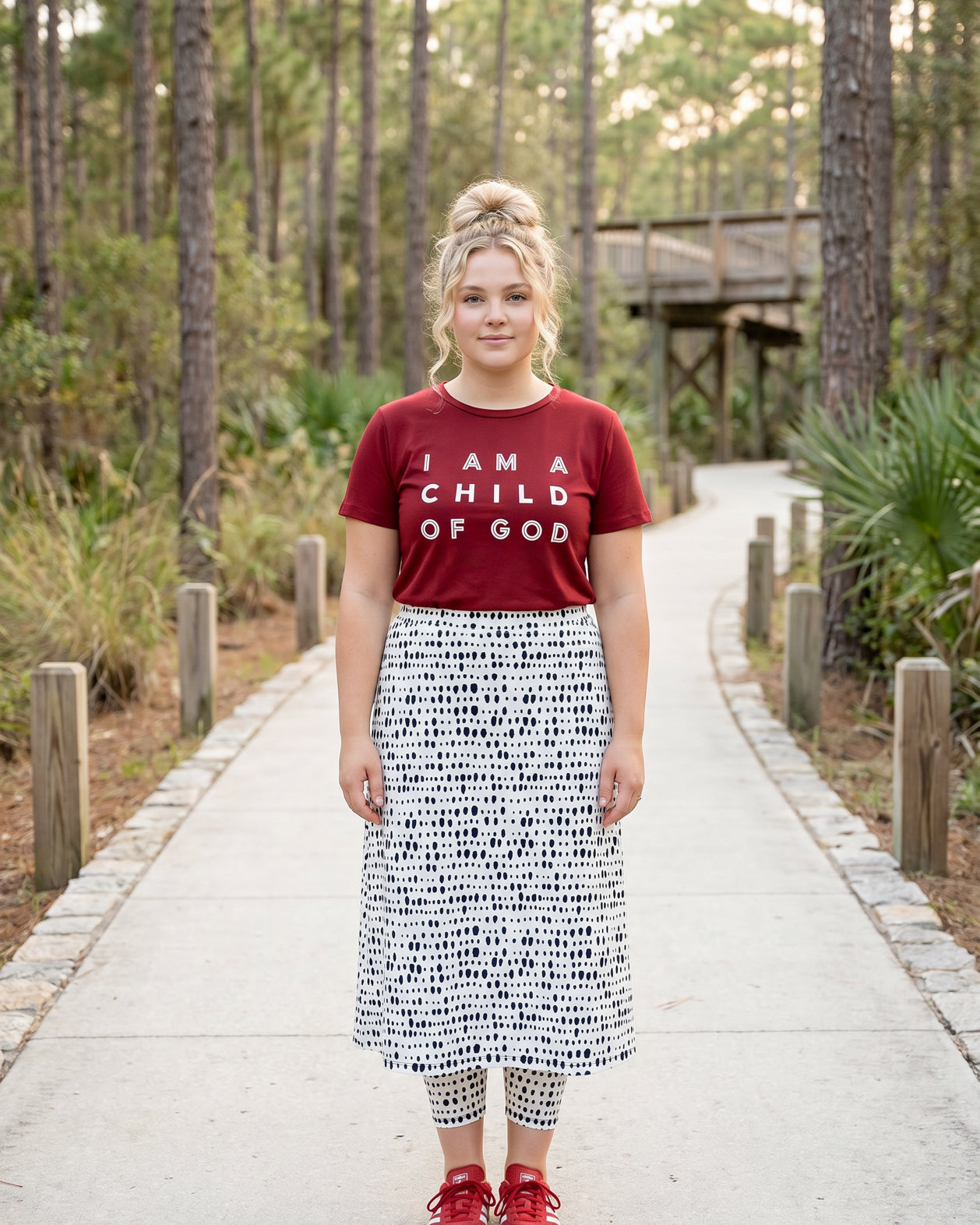 Model wearing Nuggles® 31" All-Sport Skirt in Dash Print
