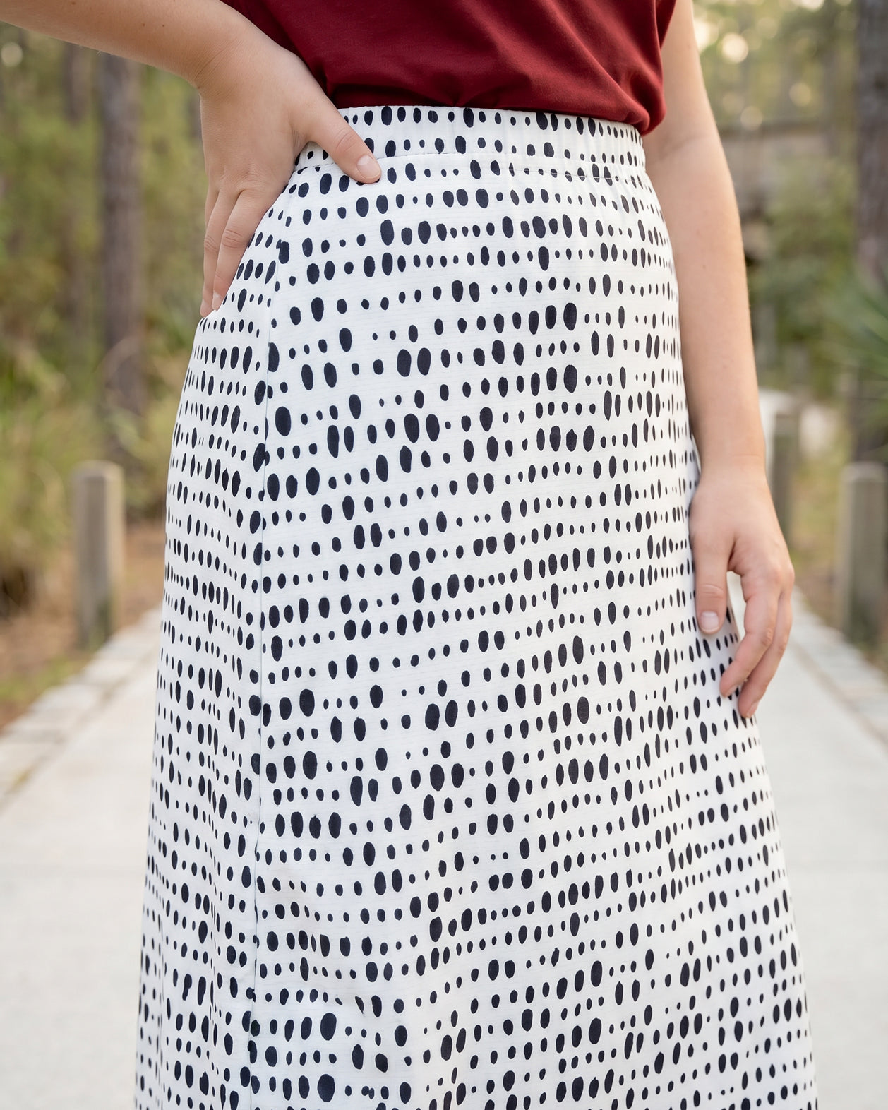 Model wearing Nuggles® 31" All-Sport Skirt in Dash Print