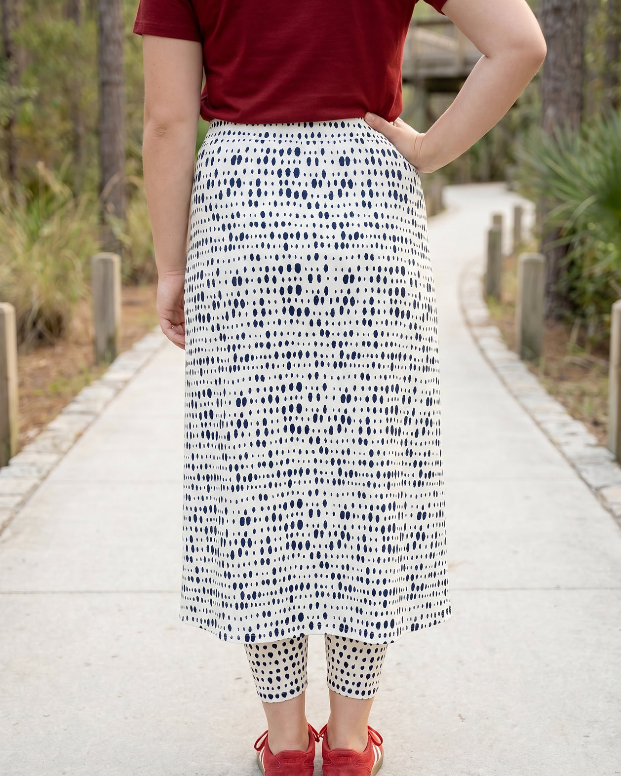 Model wearing Nuggles® 31" All-Sport Skirt in Dash Print