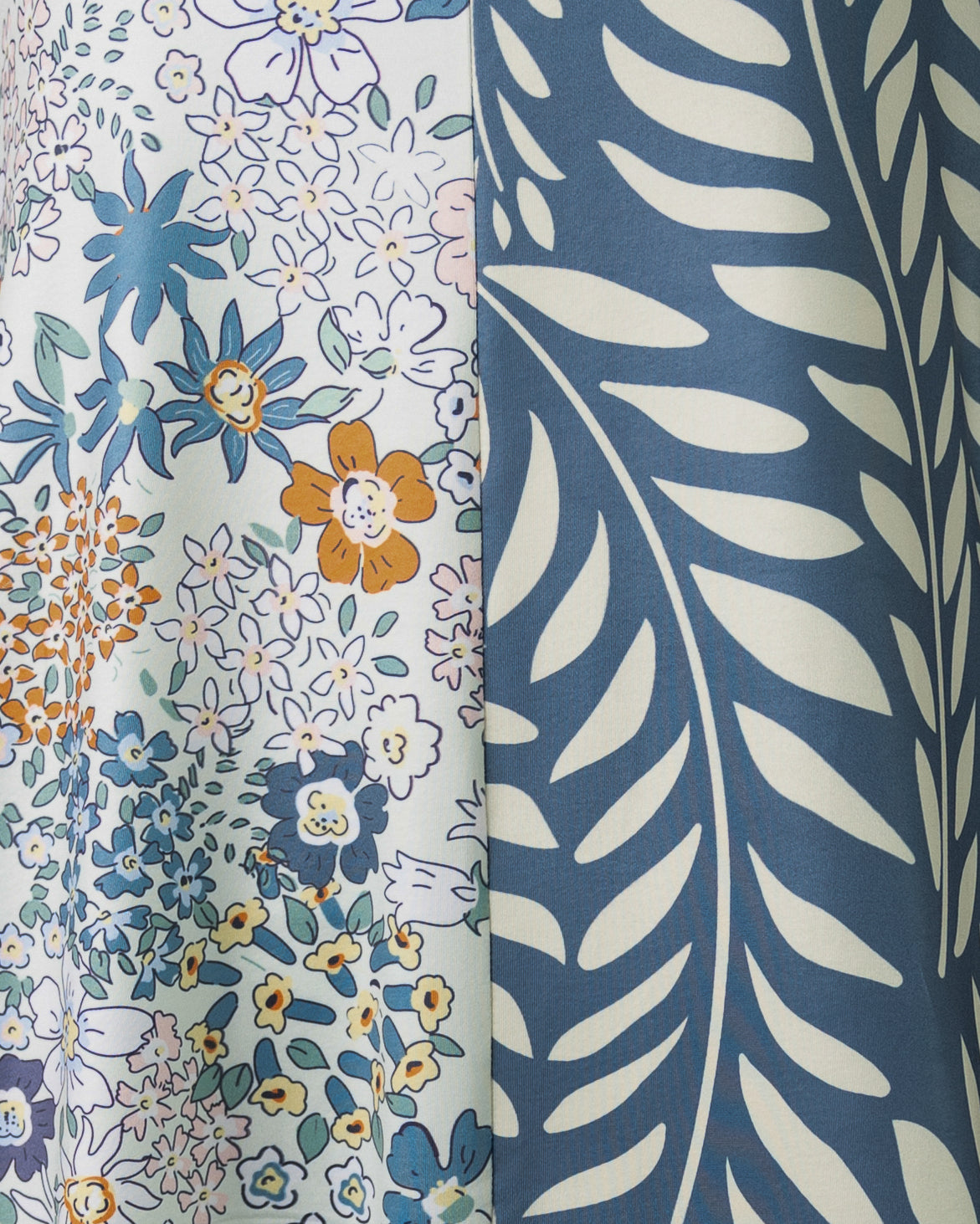 Detail shot of a flower and leaf fabric.