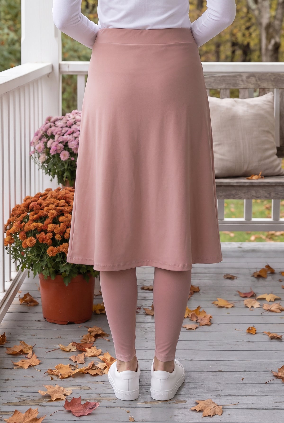 Model wearing Nuggles® Tilly Sport Skirt in Dusty Pink