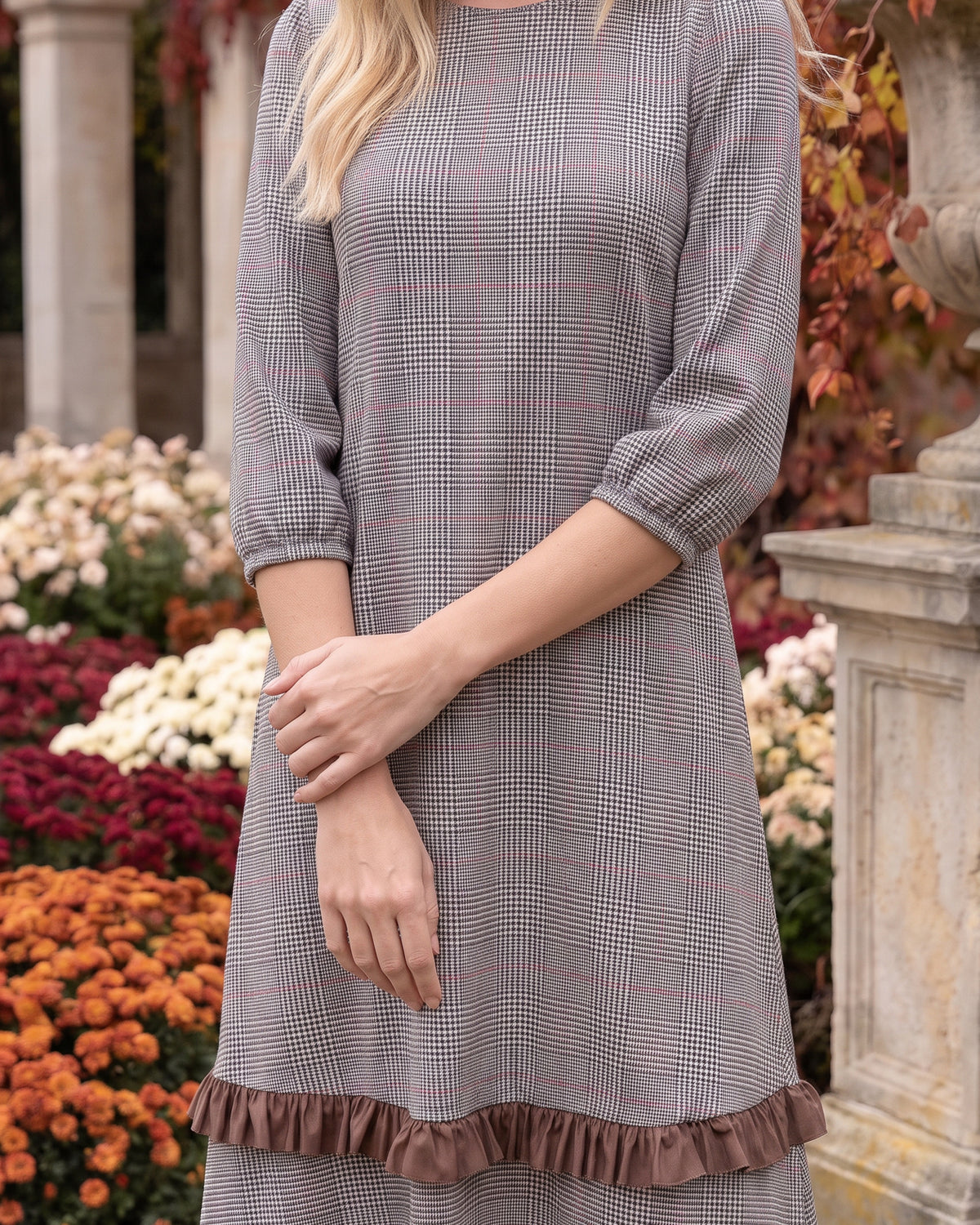 Model wearing Nuggles® Patricia Midi Dress in Glen Plaid
