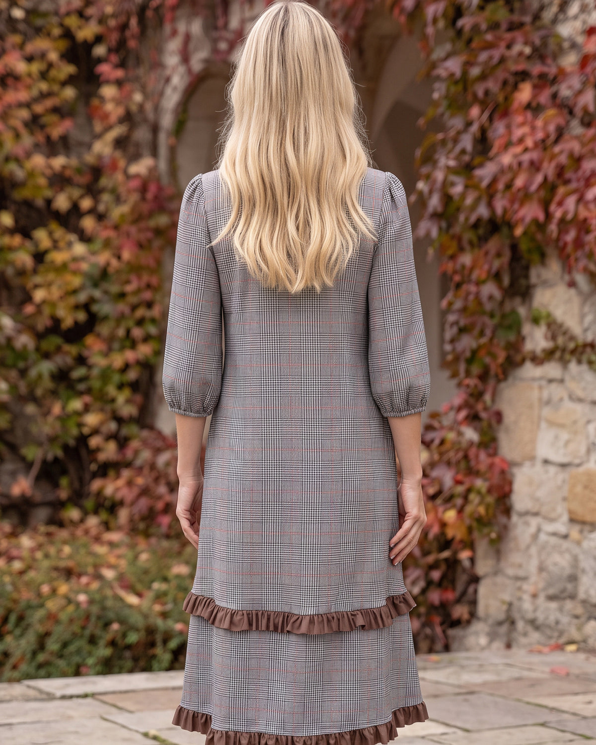 Model wearing Nuggles® Patricia Midi Dress in Glen Plaid