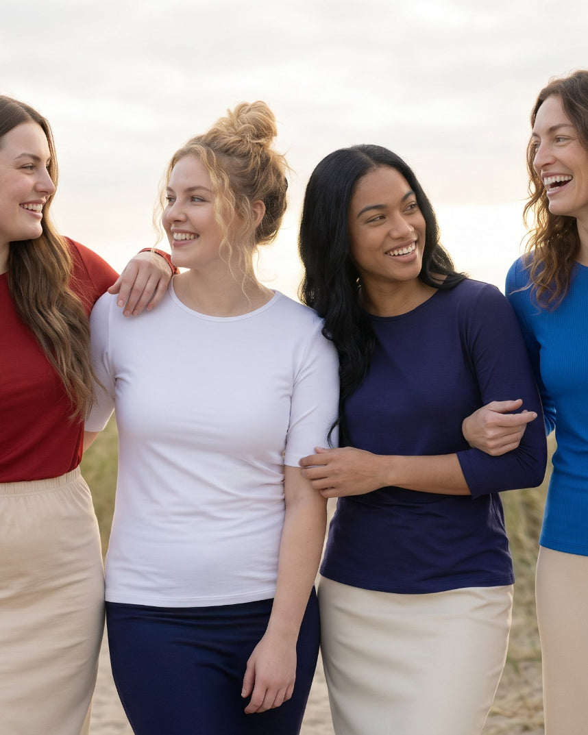 A group of women wearing the essential tees in different sleeve.