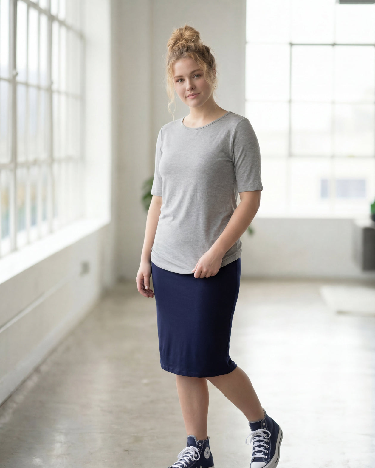 Model wearing Nuggles® Half Sleeve Essential Tee in Light Heather