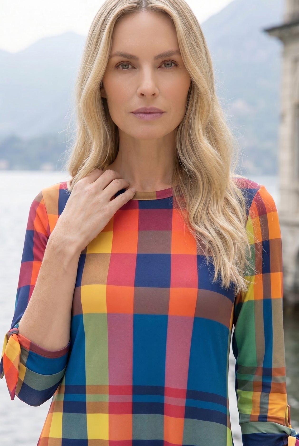 Model wearing Nuggles® Gracie Dress in Harvest Plaid