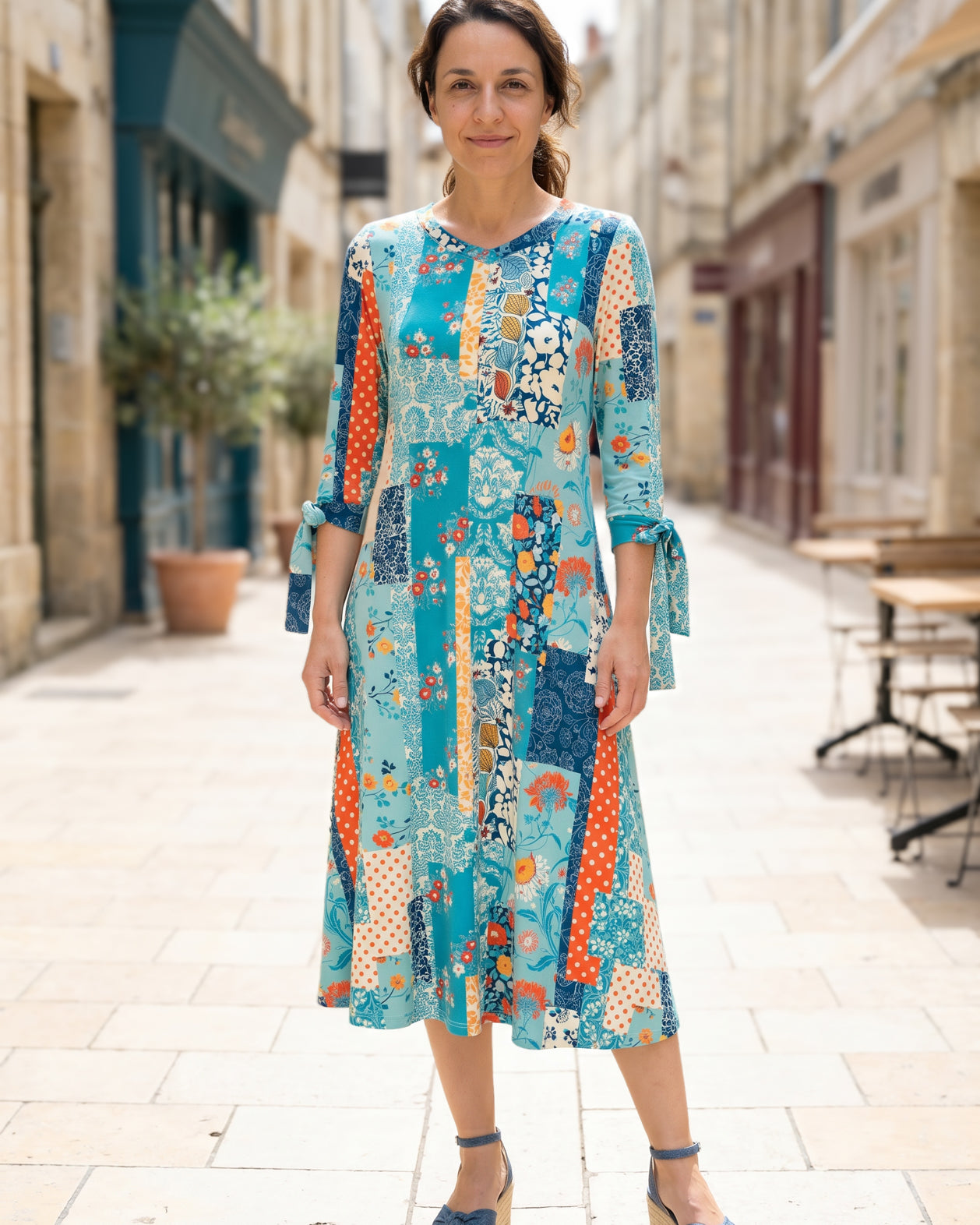 Model wearing Nuggles® Hazel Dress in Blue Bird