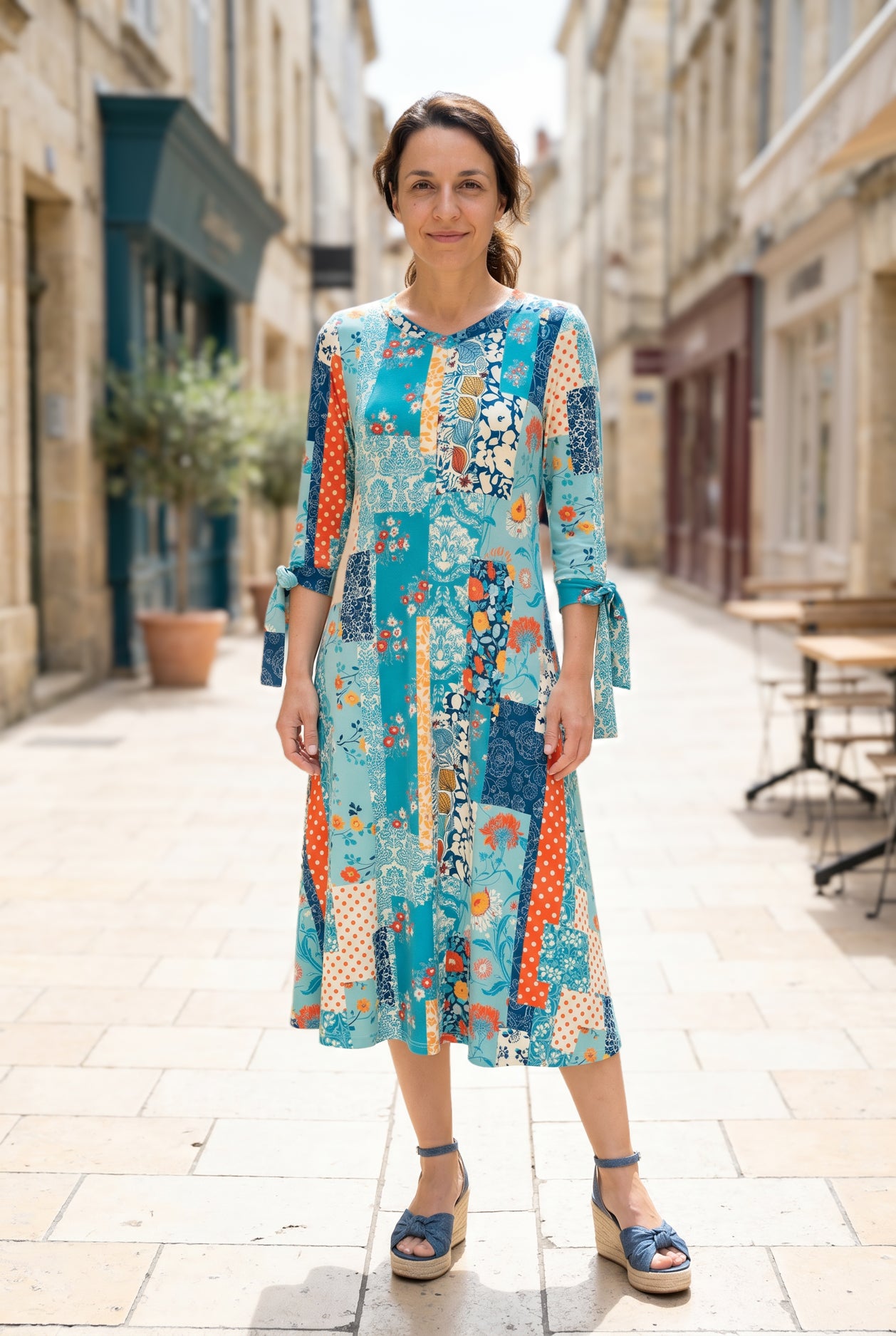Model wearing Nuggles® Hazel Dress in Blue Bird