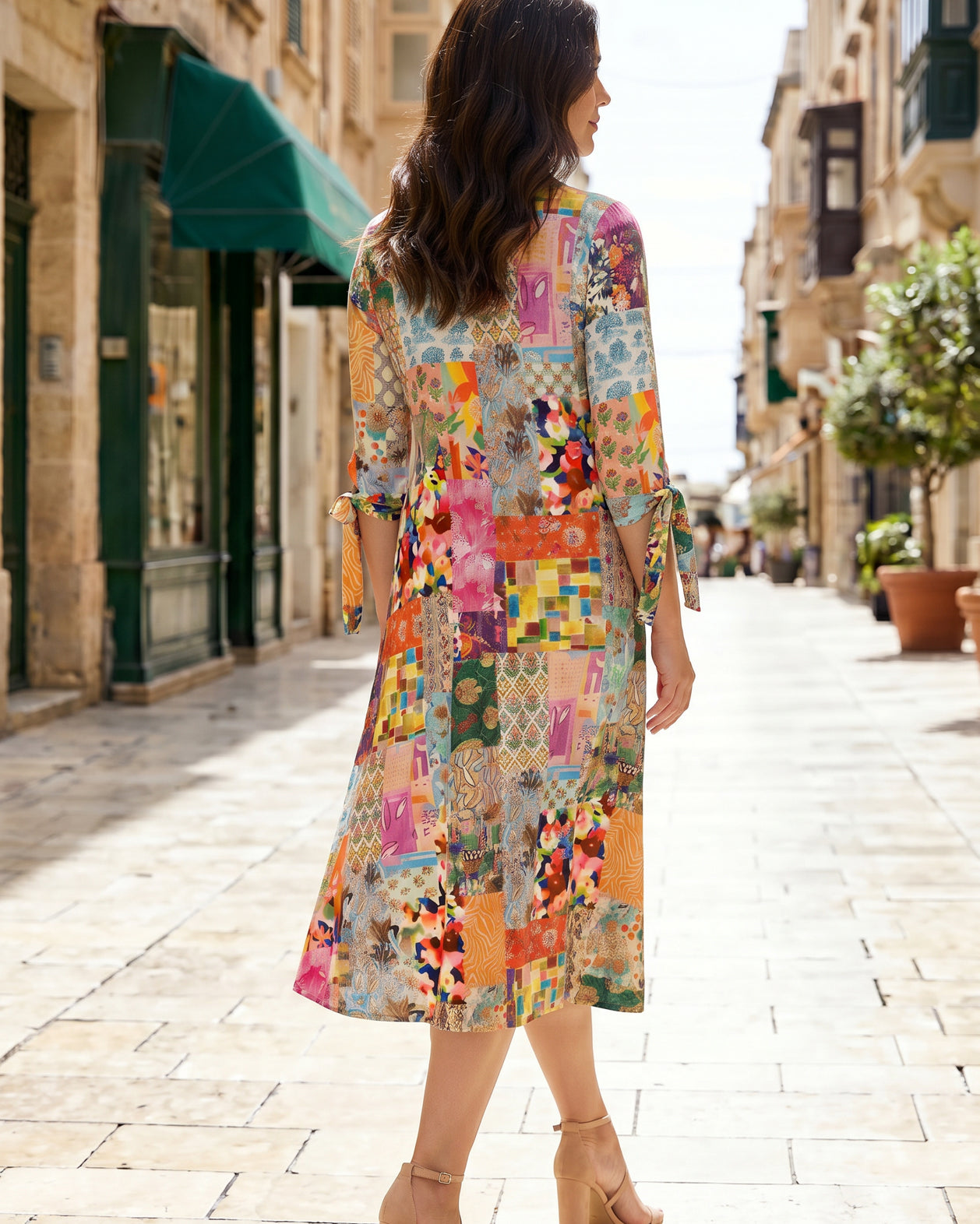 Model wearing Nuggles® Hazel Dress in Carousel