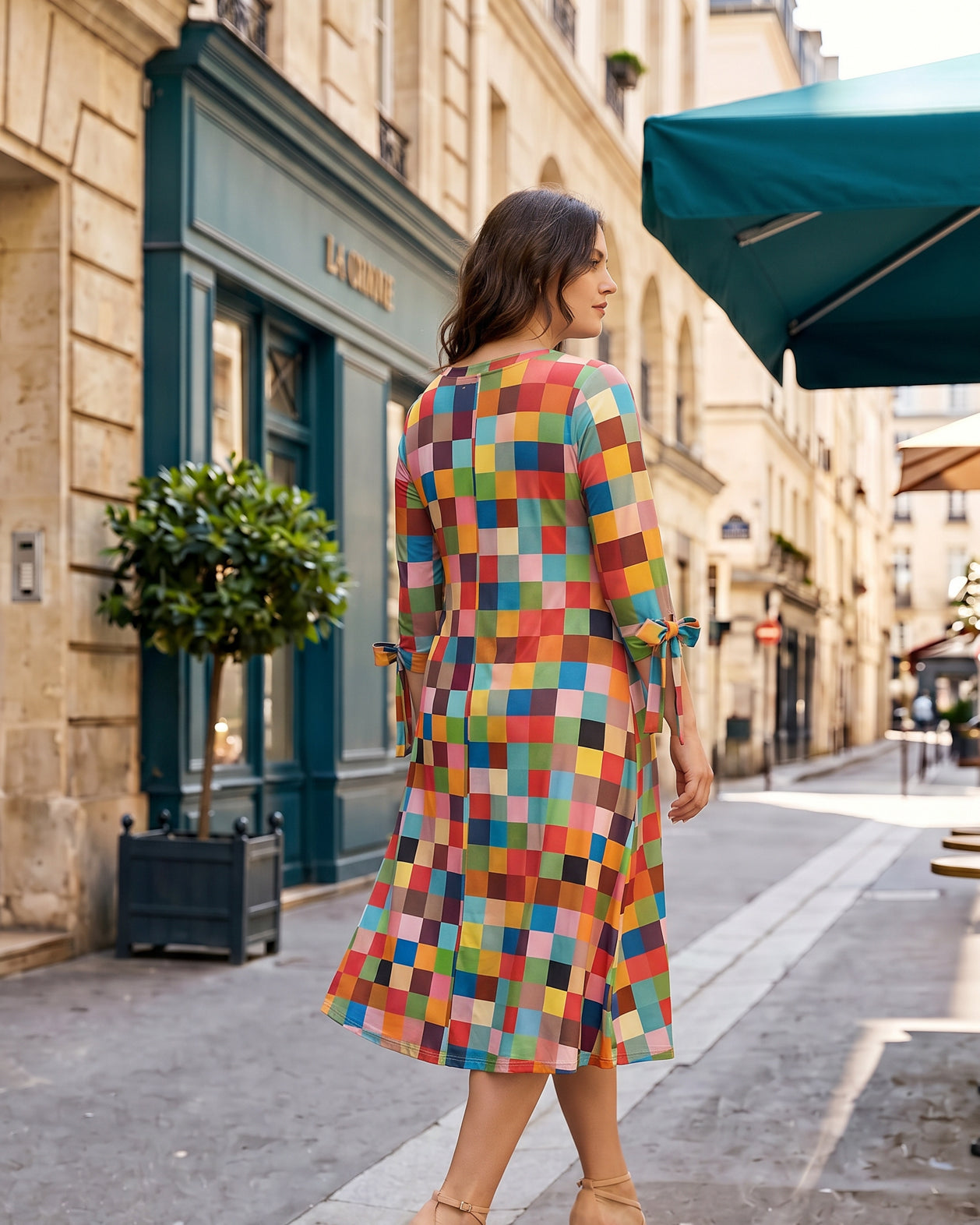 Model wearing Nuggles® Hazel Dress in Retro Mosaic
