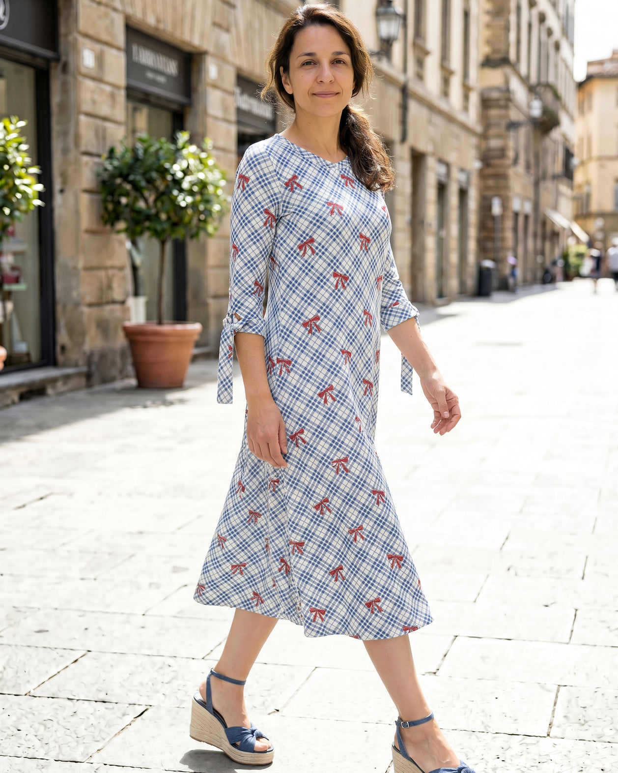 Model wearing Nuggles® Hazel Dress in Sunday Bow