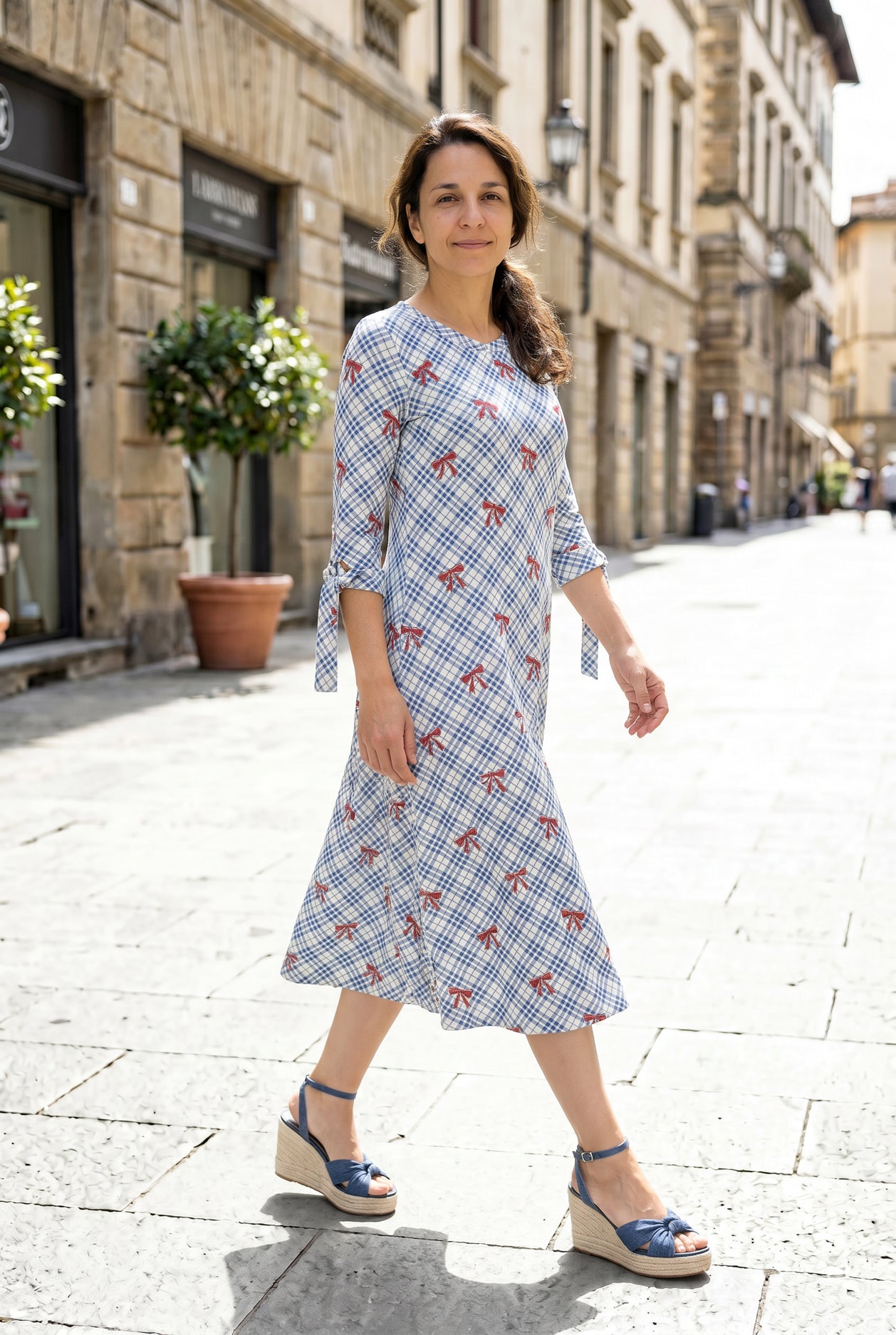 Model wearing Nuggles® Hazel Dress in Sunday Bow