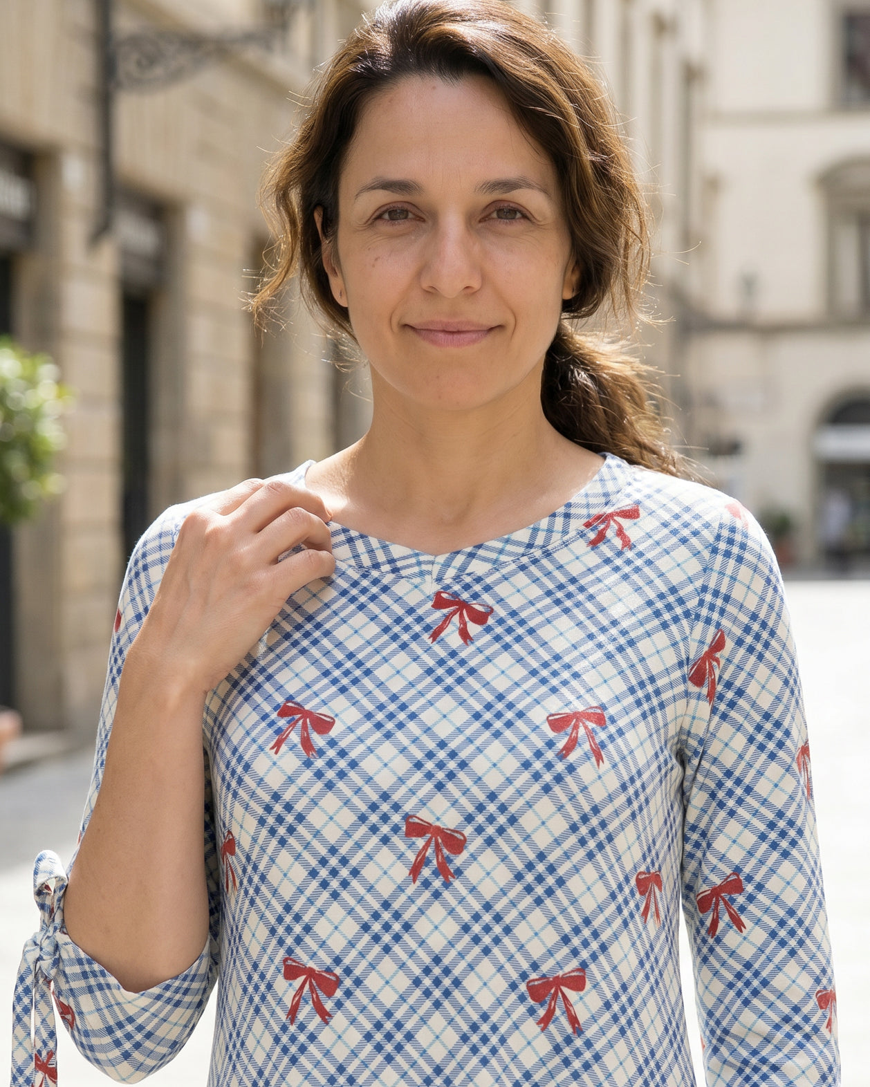 Model wearing Nuggles® Hazel Dress in Sunday Bow