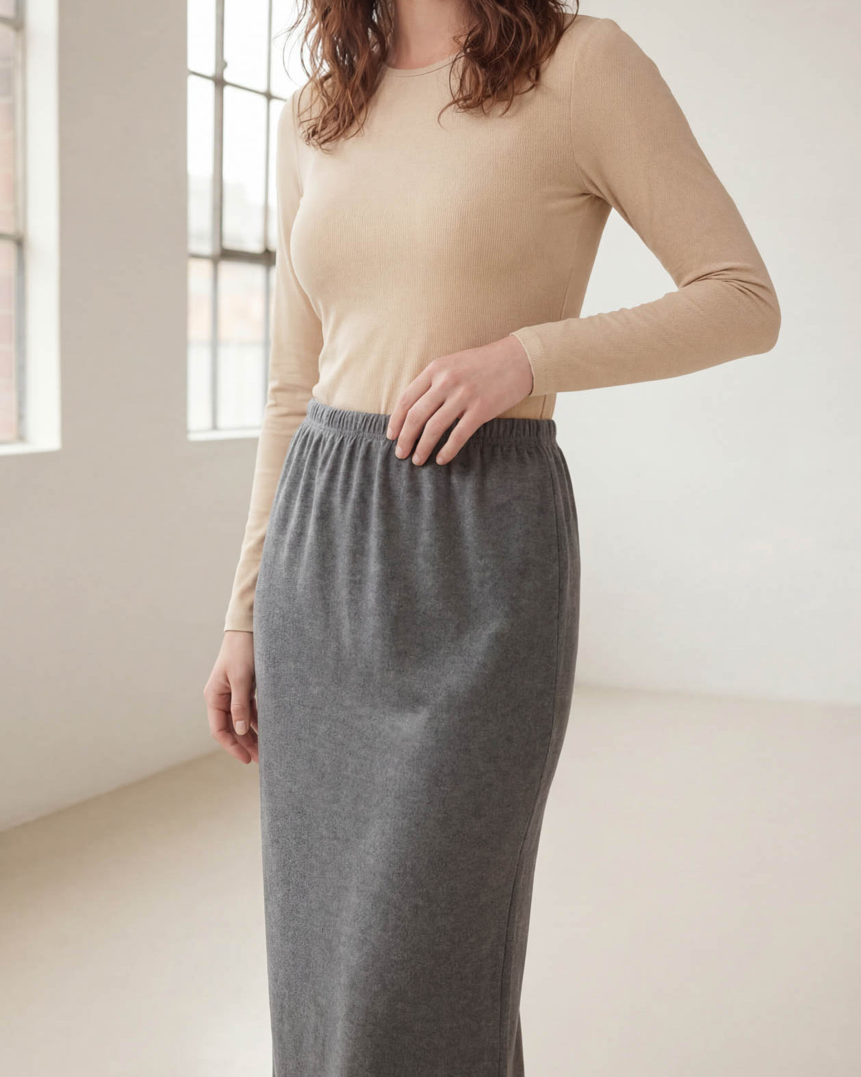 Model wearing Nuggles® 36" Classic Skirt in Heather Gray