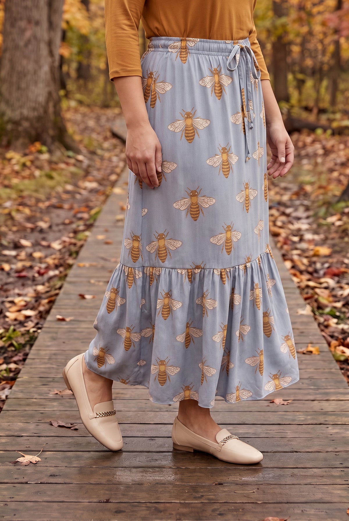 Model wearing Nuggles® Sage Skirt in Honey Bee