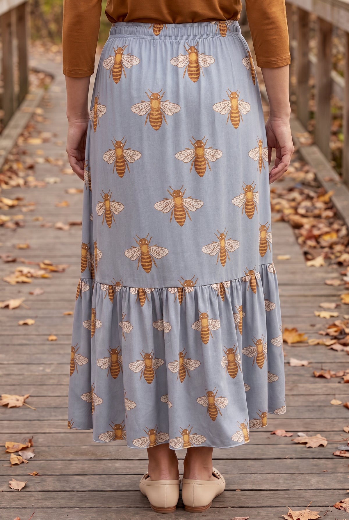 Model wearing Nuggles® Sage Skirt in Honey Bee