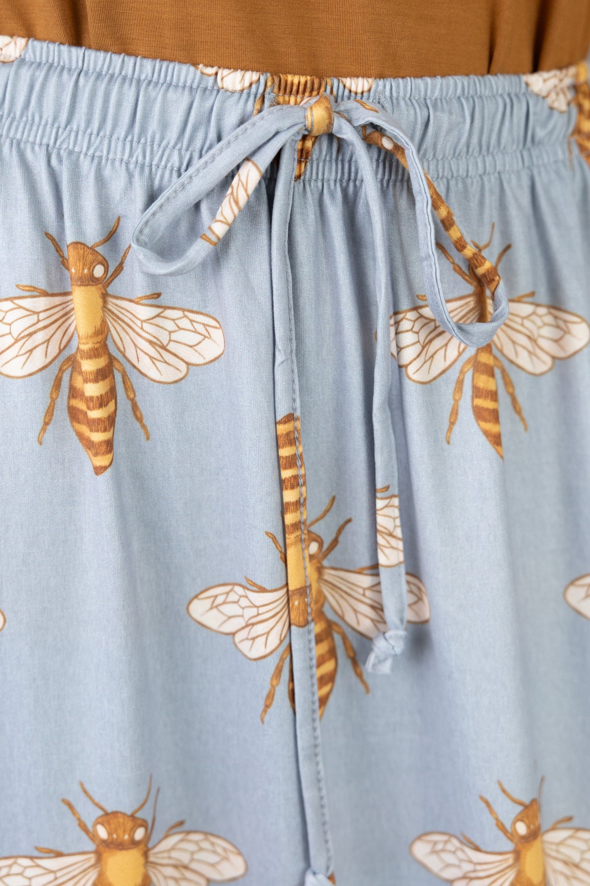 Model wearing Nuggles® Sage Skirt in Honey Bee
