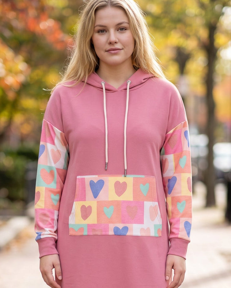 Model wearing Nuggles® Hoodie Dress in Candy Hearts