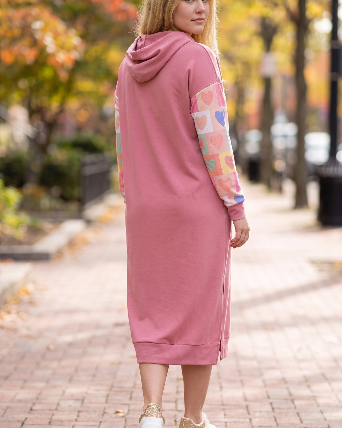 Model wearing Nuggles® Hoodie Dress in Candy Hearts