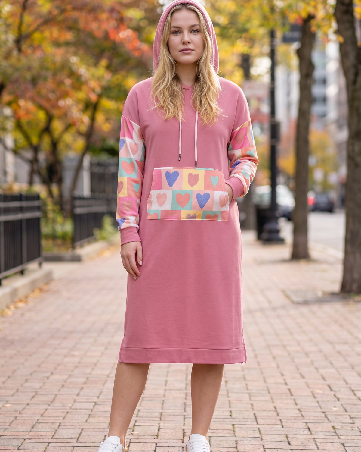 Model wearing Nuggles® Hoodie Dress in Candy Hearts