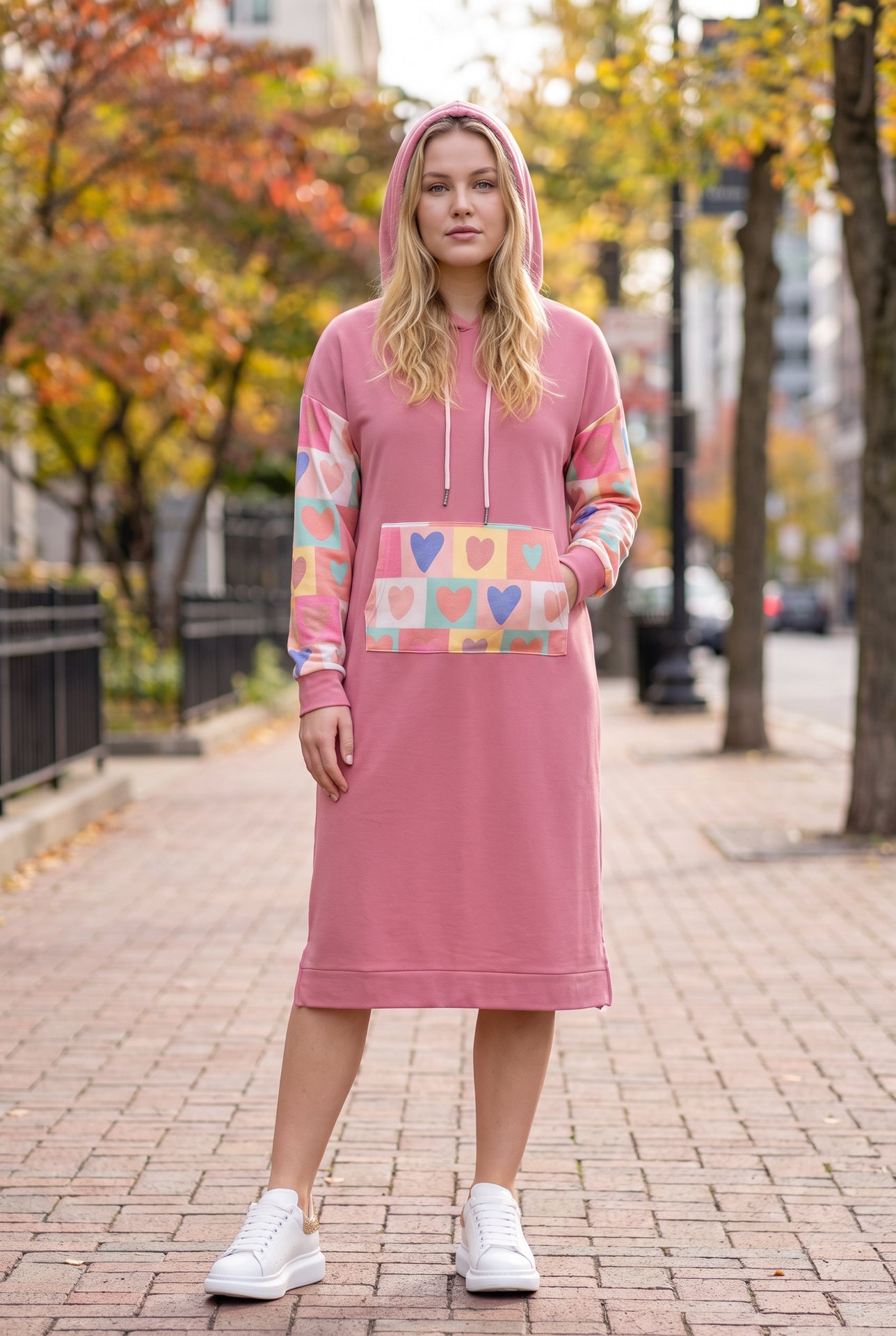 Model wearing Nuggles® Hoodie Dress in Candy Hearts