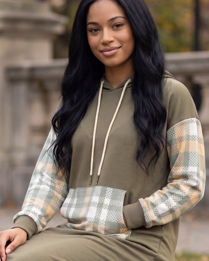 Model wearing Nuggles® Hoodie Dress in Olive Plaid