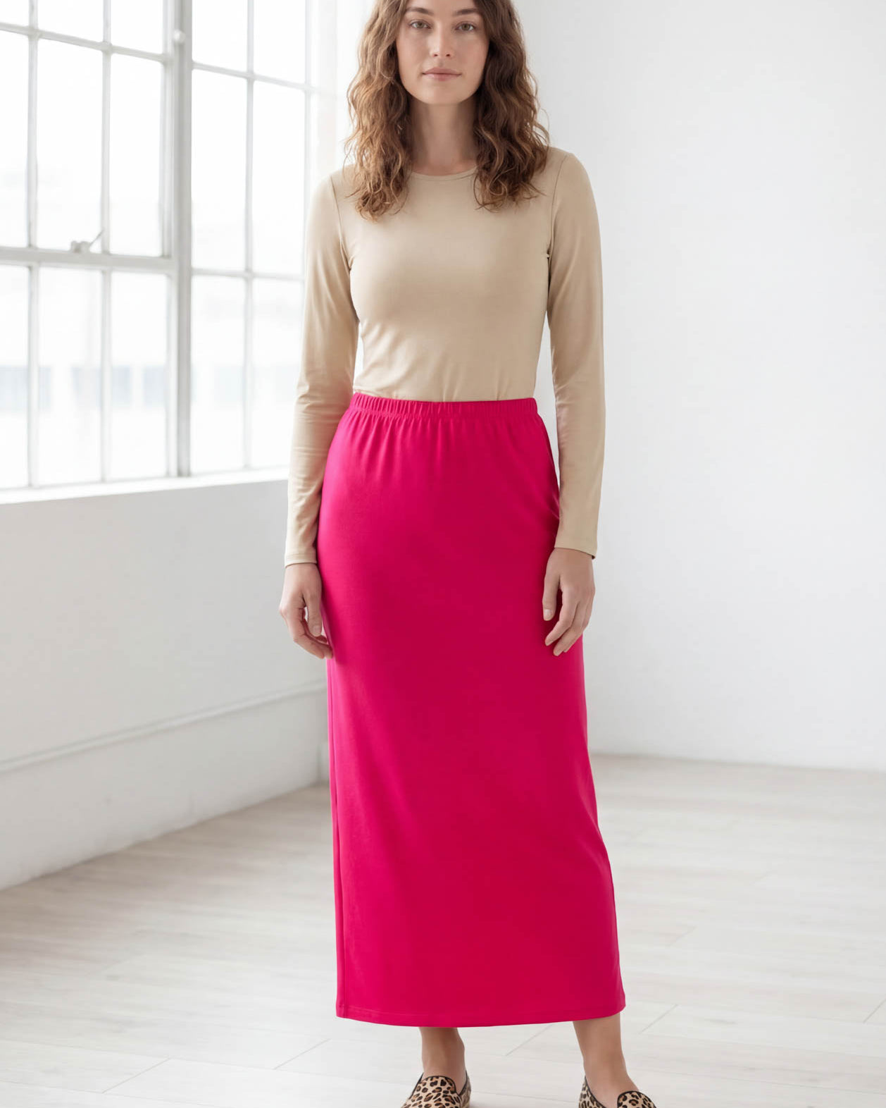 Model wearing Nuggles® 36" Classic Skirt in Hot Pink