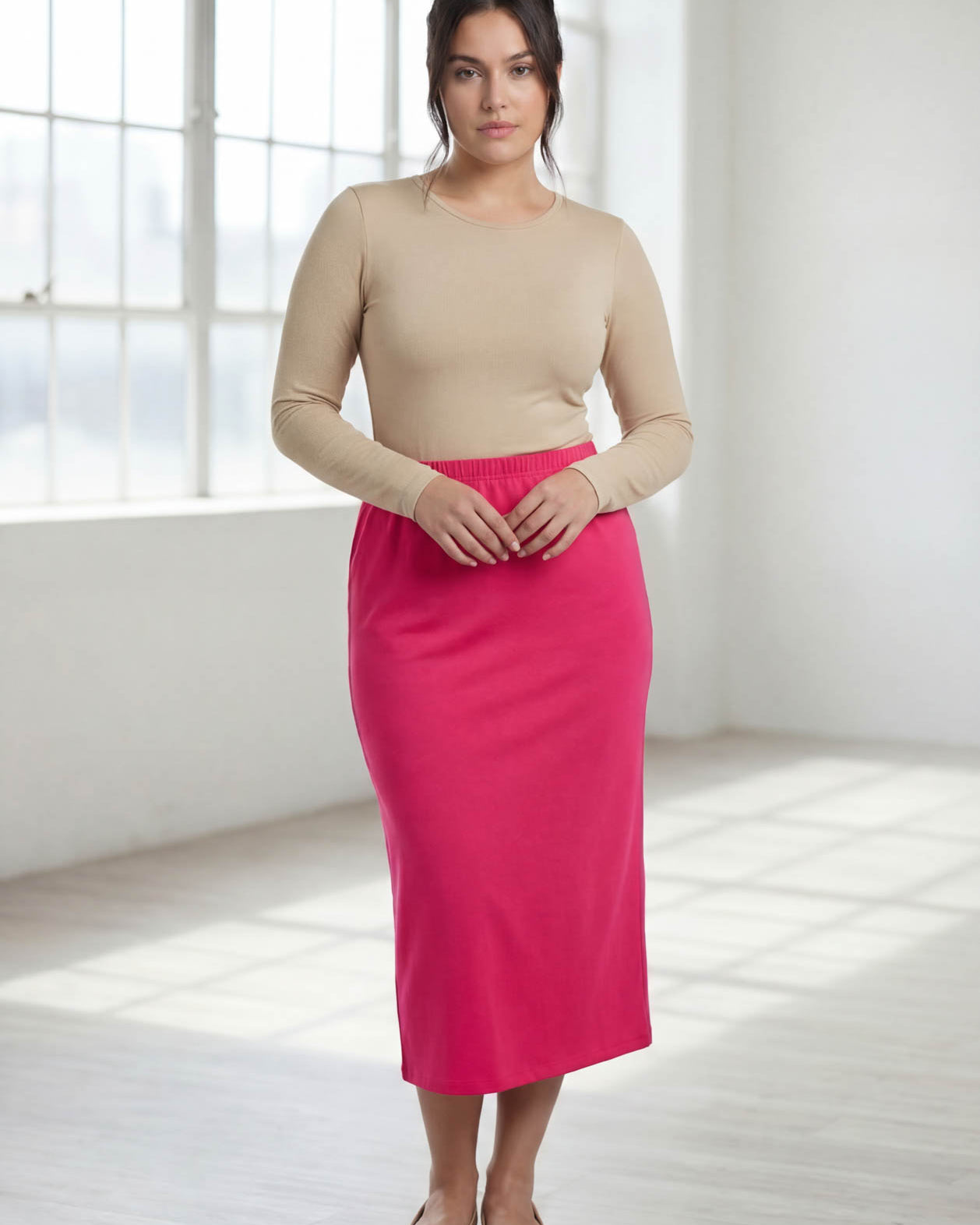 Model wearing Nuggles® 31" Classic Skirt in Hot Pink