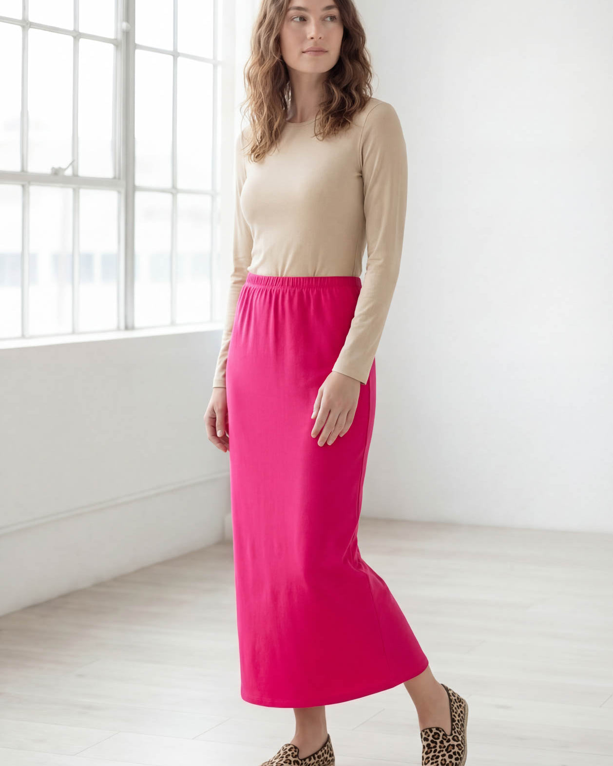 Model wearing Nuggles® 36" Classic Skirt in Hot Pink
