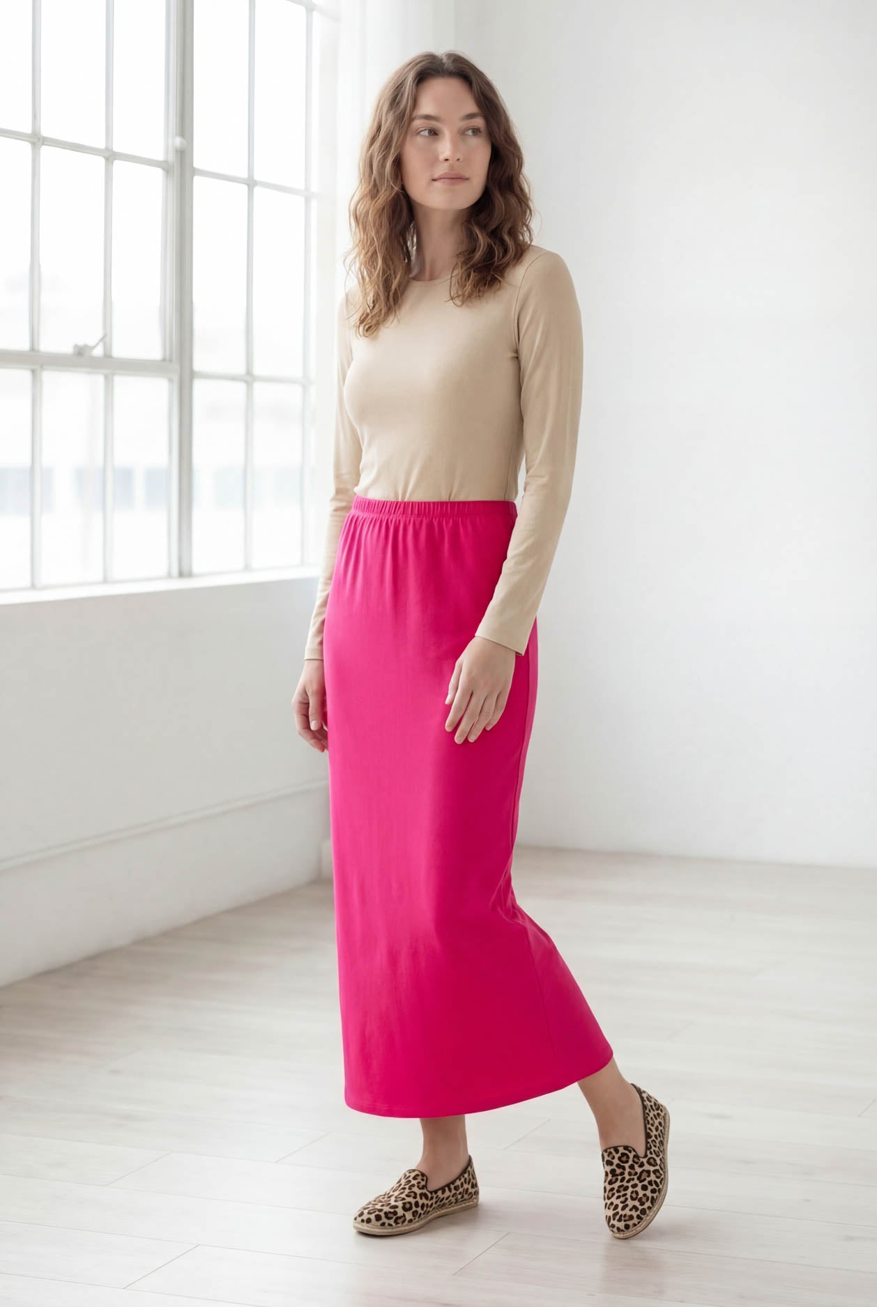 Model wearing Nuggles® 36" Classic Skirt in Hot Pink
