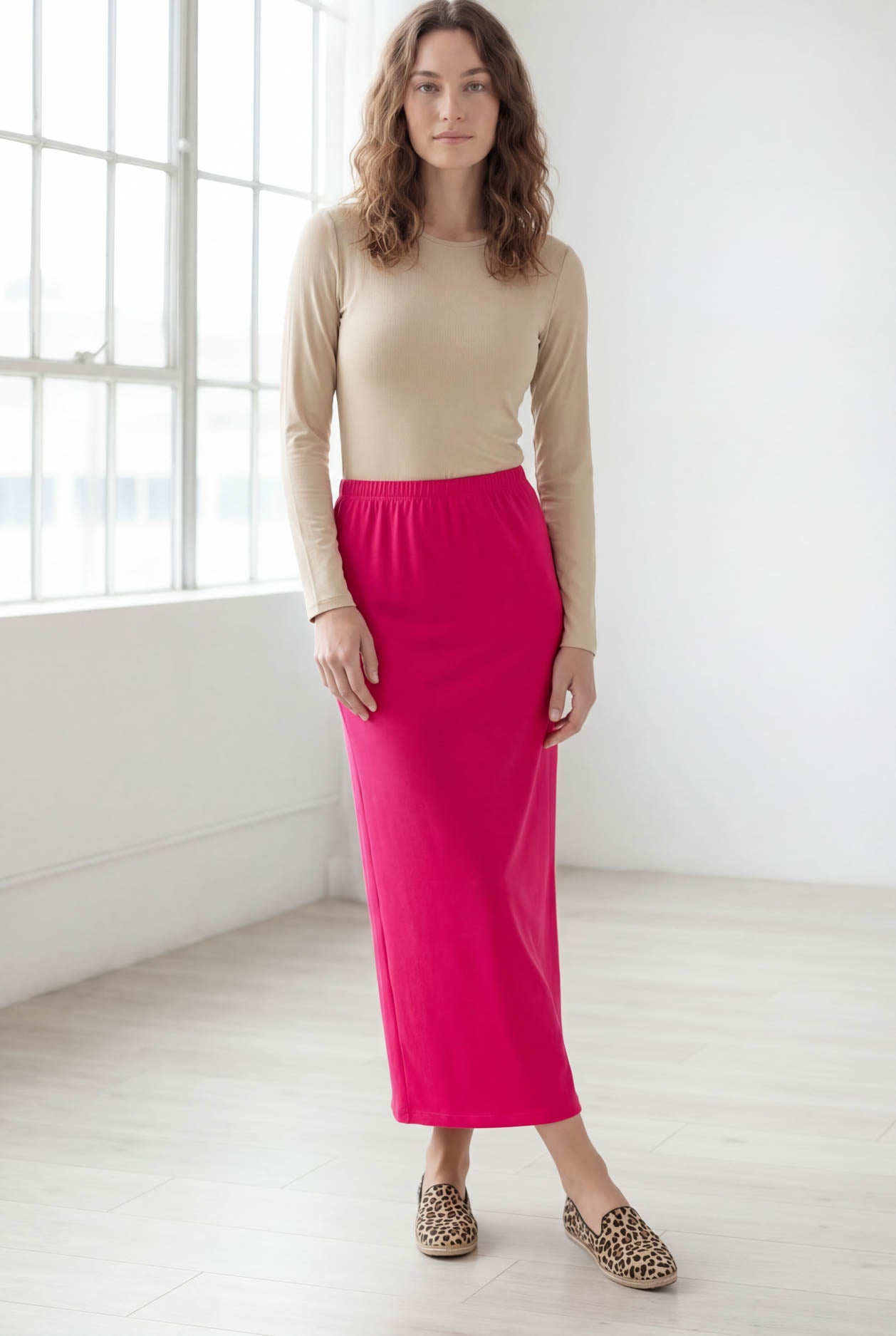 Model wearing Nuggles® 36" Classic Skirt in Hot Pink