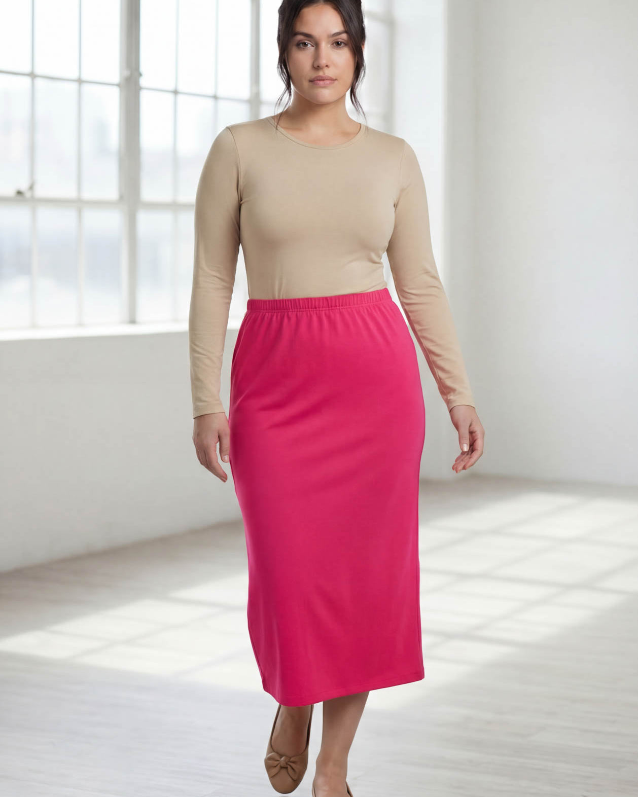 Model wearing Nuggles® 31" Classic Skirt in Hot Pink
