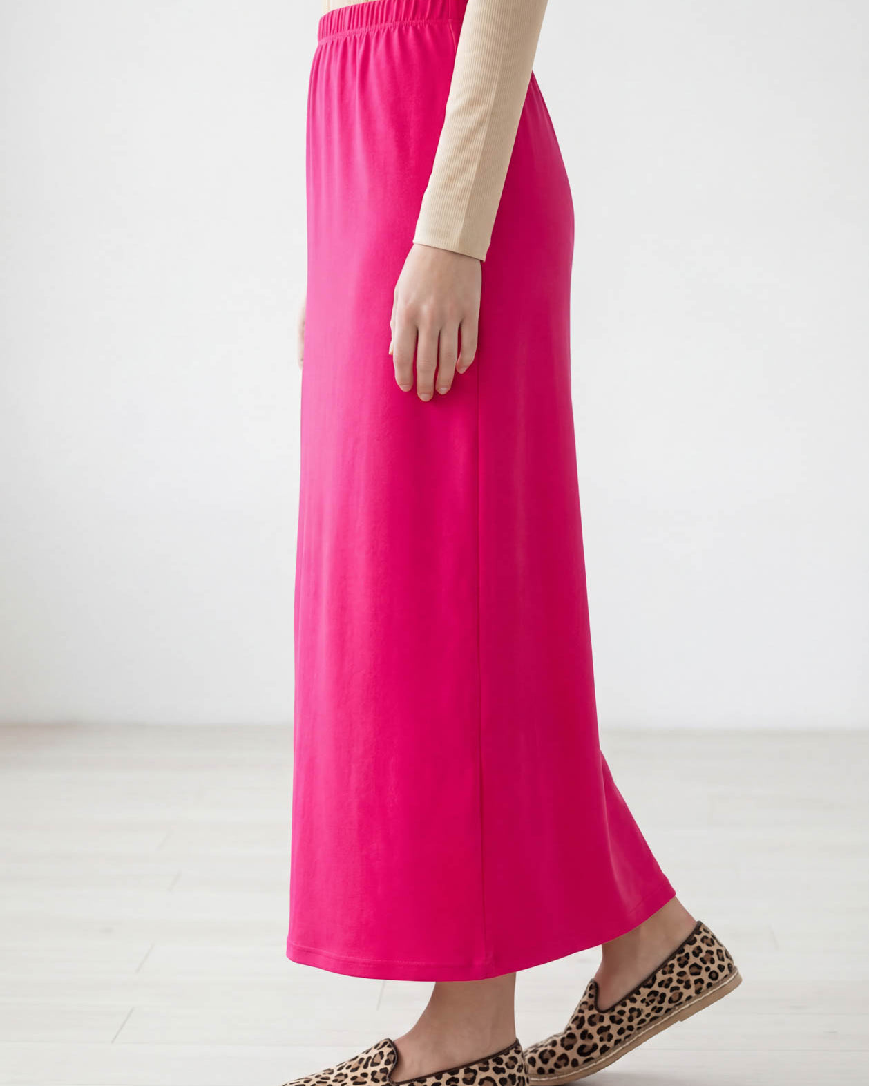 Model wearing Nuggles® 36" Classic Skirt in Hot Pink
