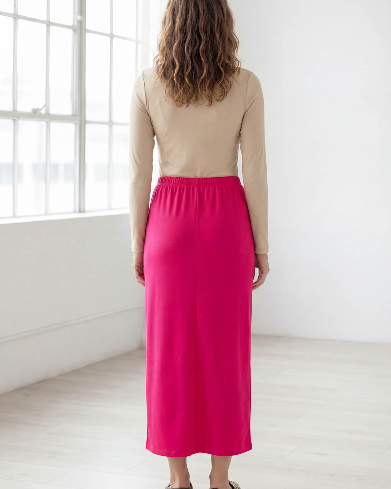 Model wearing Nuggles® 36" Classic Skirt in Hot Pink