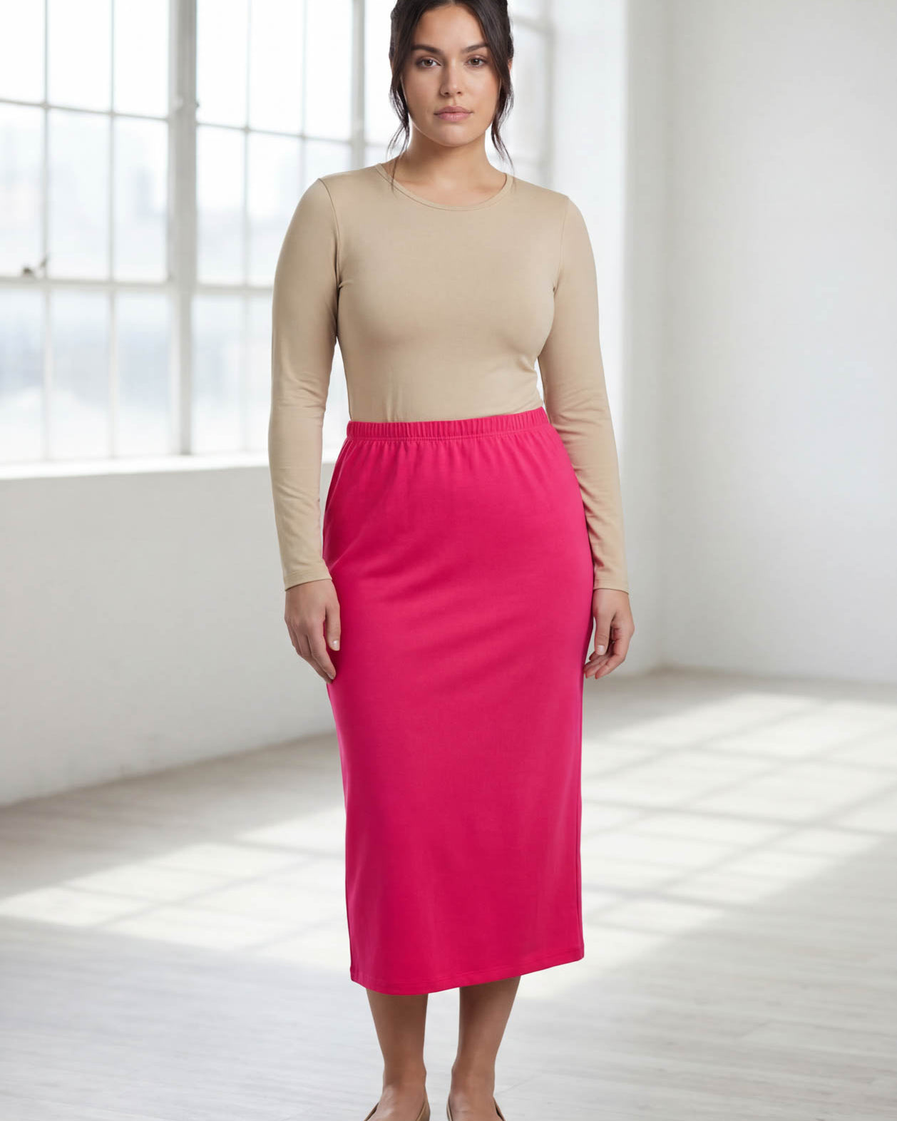 Model wearing Nuggles® 31" Classic Skirt in Hot Pink