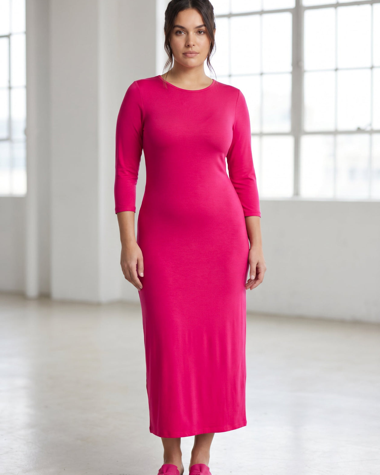 Model wearing Nuggles® Tea Layering Dress in Hot Pink