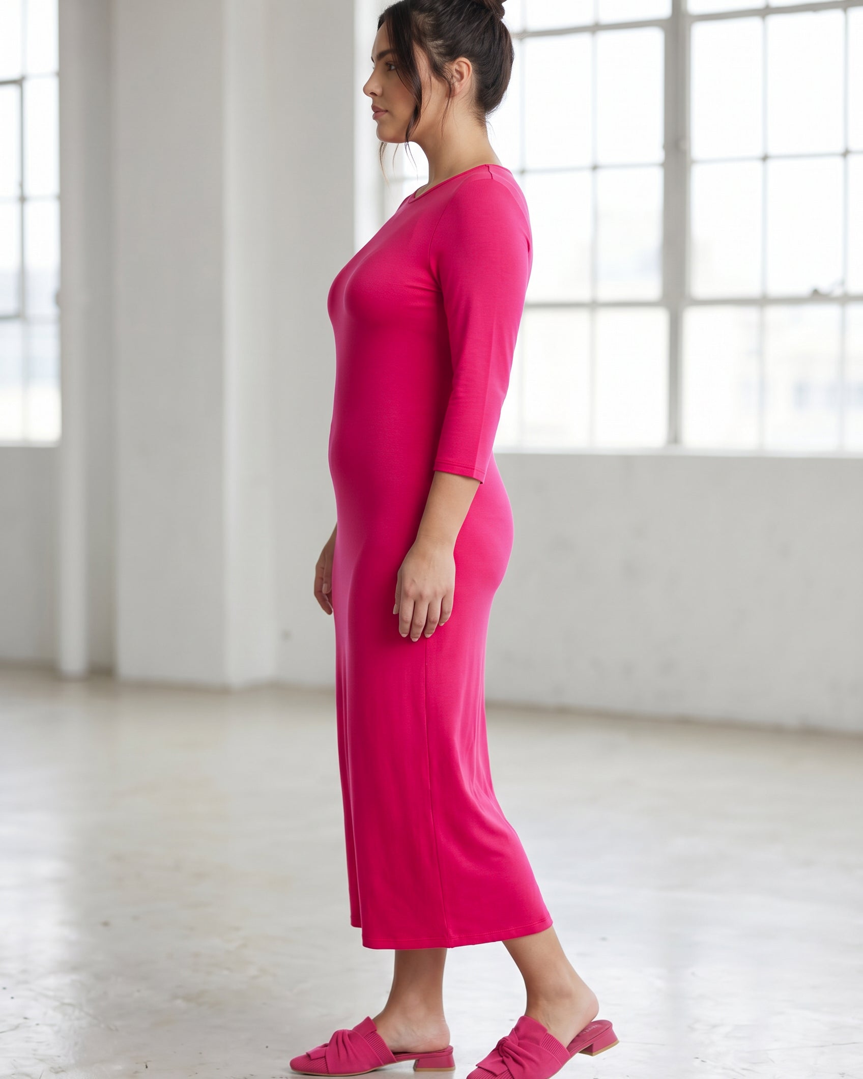 Model wearing Nuggles® Tea Layering Dress in Hot Pink