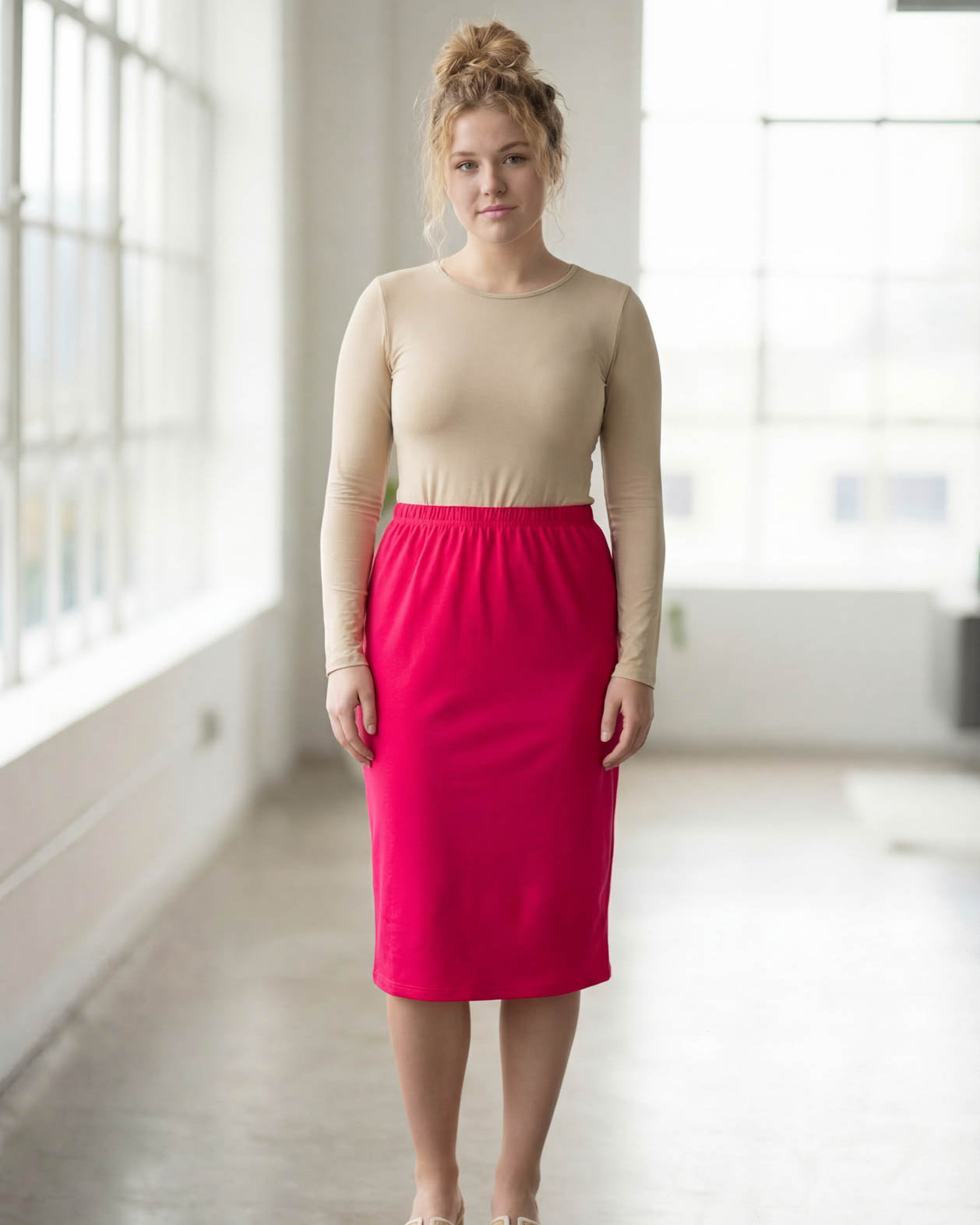Model wearing Nuggles® 27" Classic Skirt in Hot Pink
