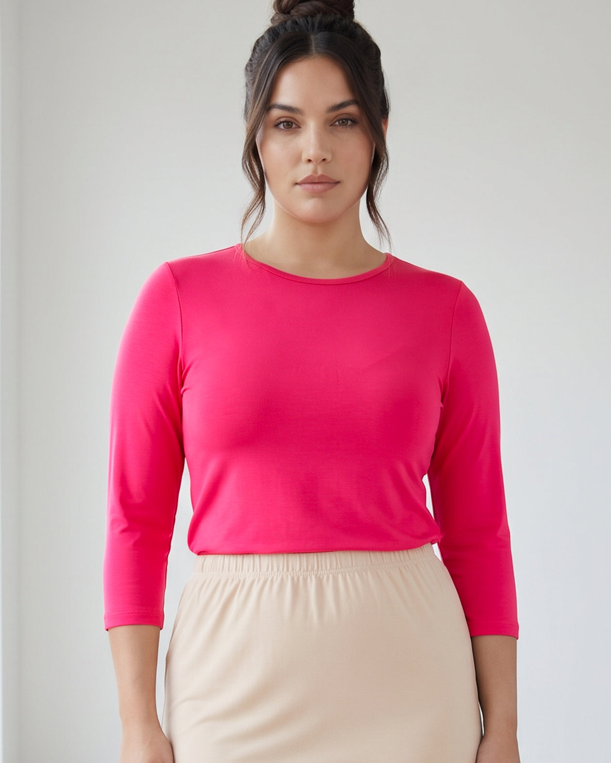 Model wearing Nuggles® 3/4 Essential Tee in Hot Pink